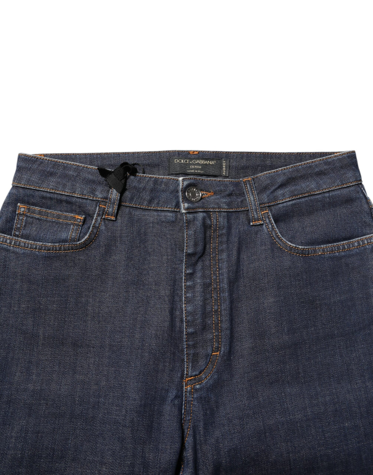 Elevate your wardrobe with Dolce & Gabbana's Blue Queen Patch AUDREY Mid Waist Denim Jeans, crafted in Italy from a luxurious cotton blend for timeless elegance and sophistication.