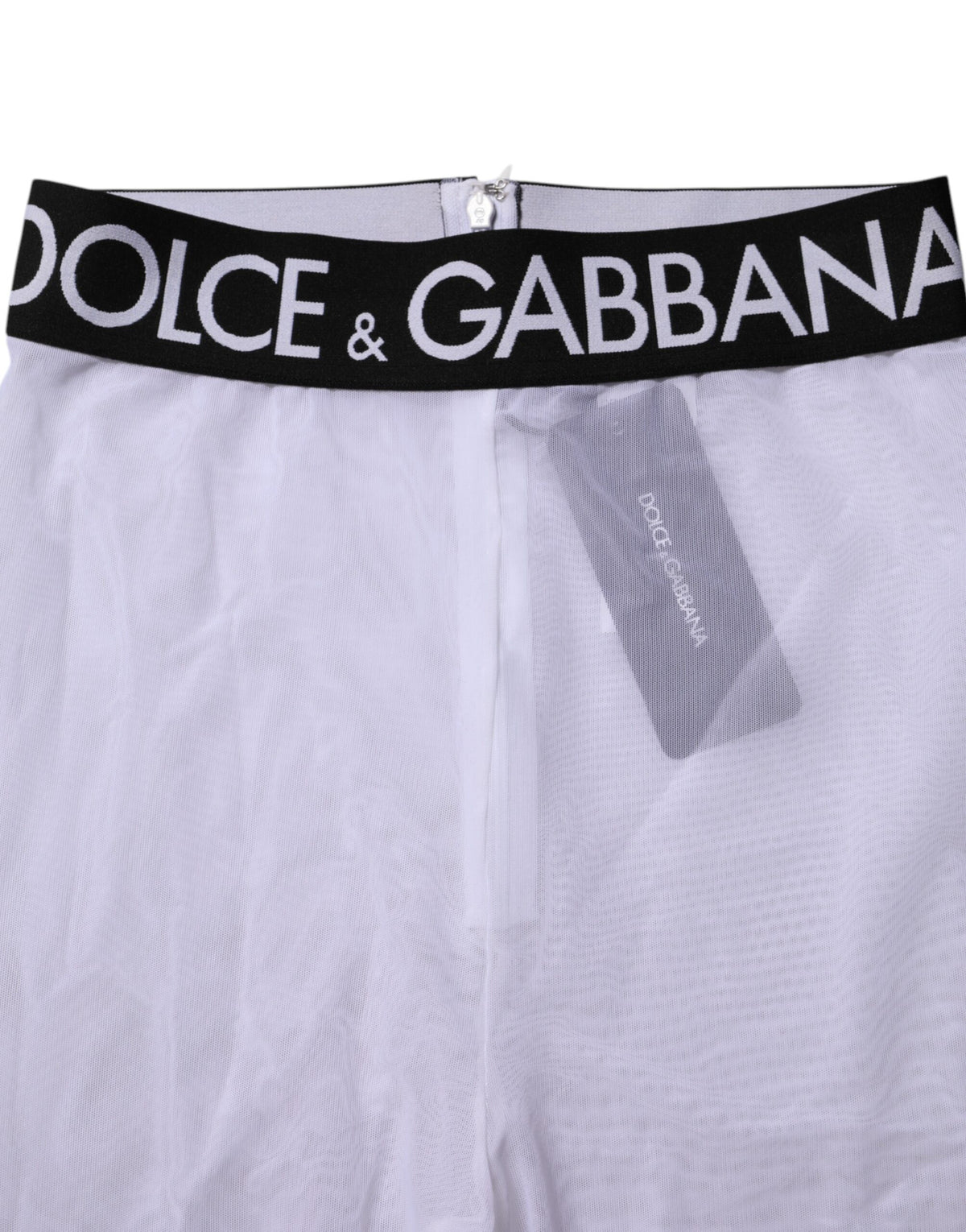 Experience the epitome of luxury with Dolce & Gabbana's Gray Nylon DG Logo Mid Waisted Leggings, crafted in Italy for a sophisticated, flattering fit that elevates any ensemble.