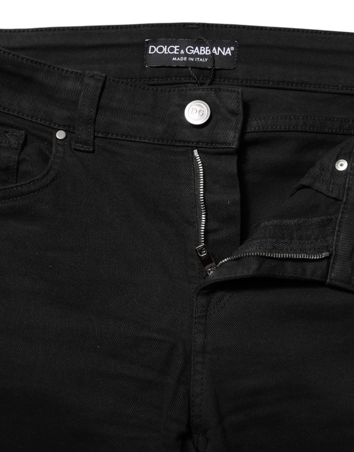 Indulge in the exquisite allure of Dolce & Gabbana's Black Skinny Cotton Mid Waisted Denim Jeans, crafted in Italy for a luxurious fit that embodies timeless elegance.