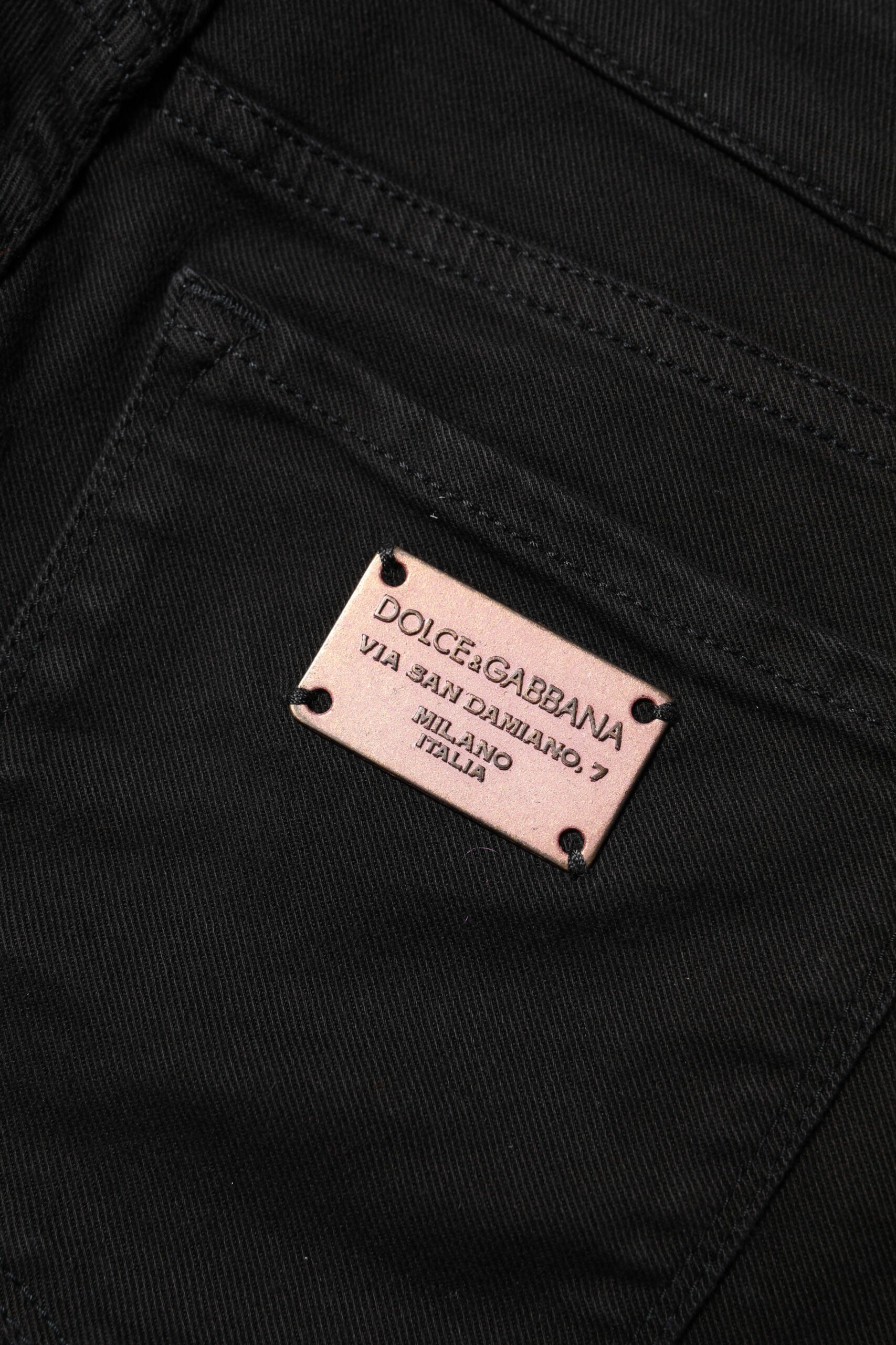 Indulge in the exquisite Dolce & Gabbana Black Cotton Skinny Mid Waisted Denim Jeans, crafted in Italy for an unparalleled fit that embodies timeless luxury and sophistication.