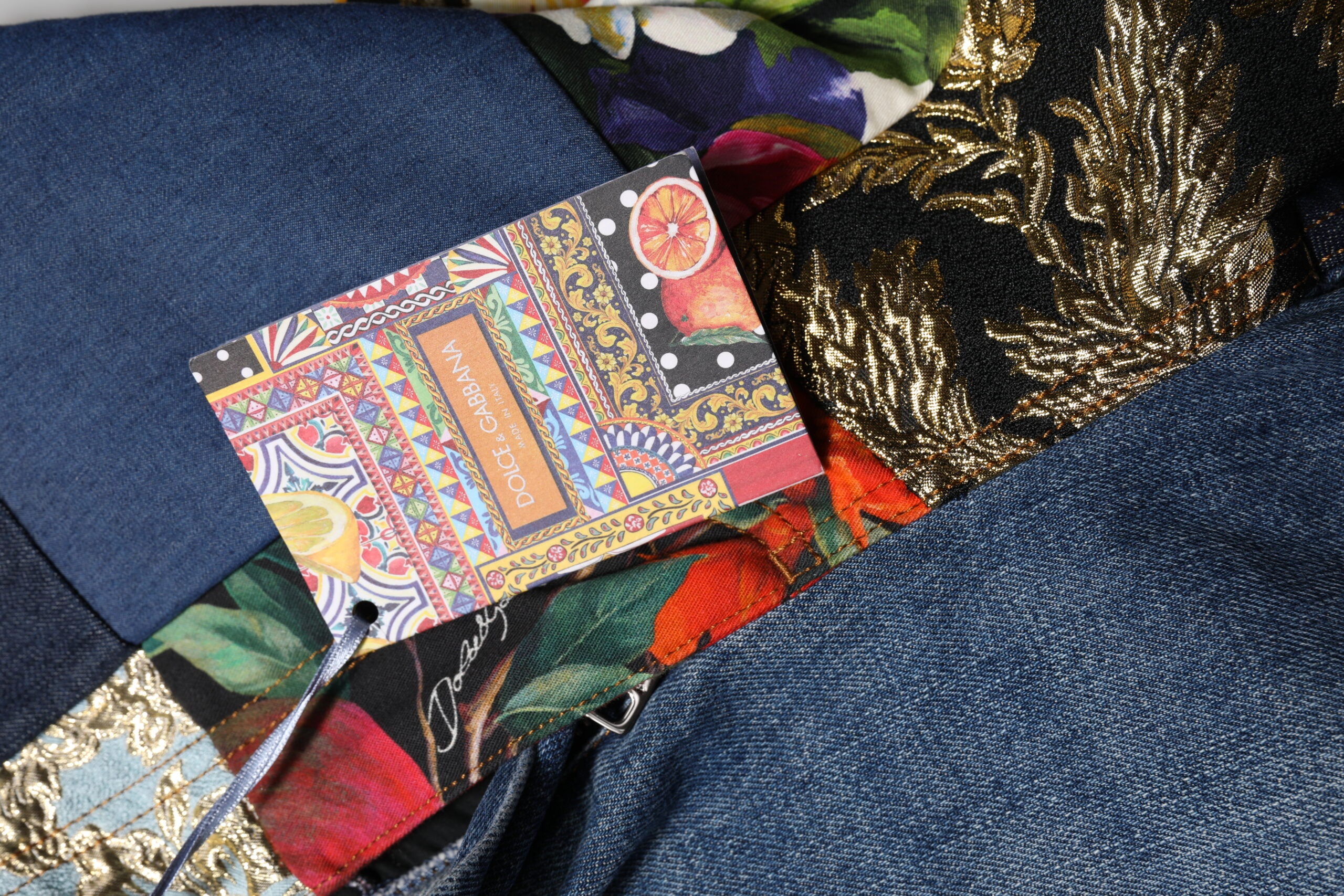 Elevate your wardrobe with Dolce & Gabbana's Blue AMBER Patchwork High Waist Denim Jeans, where exquisite Italian craftsmanship meets luxurious design for timeless allure.