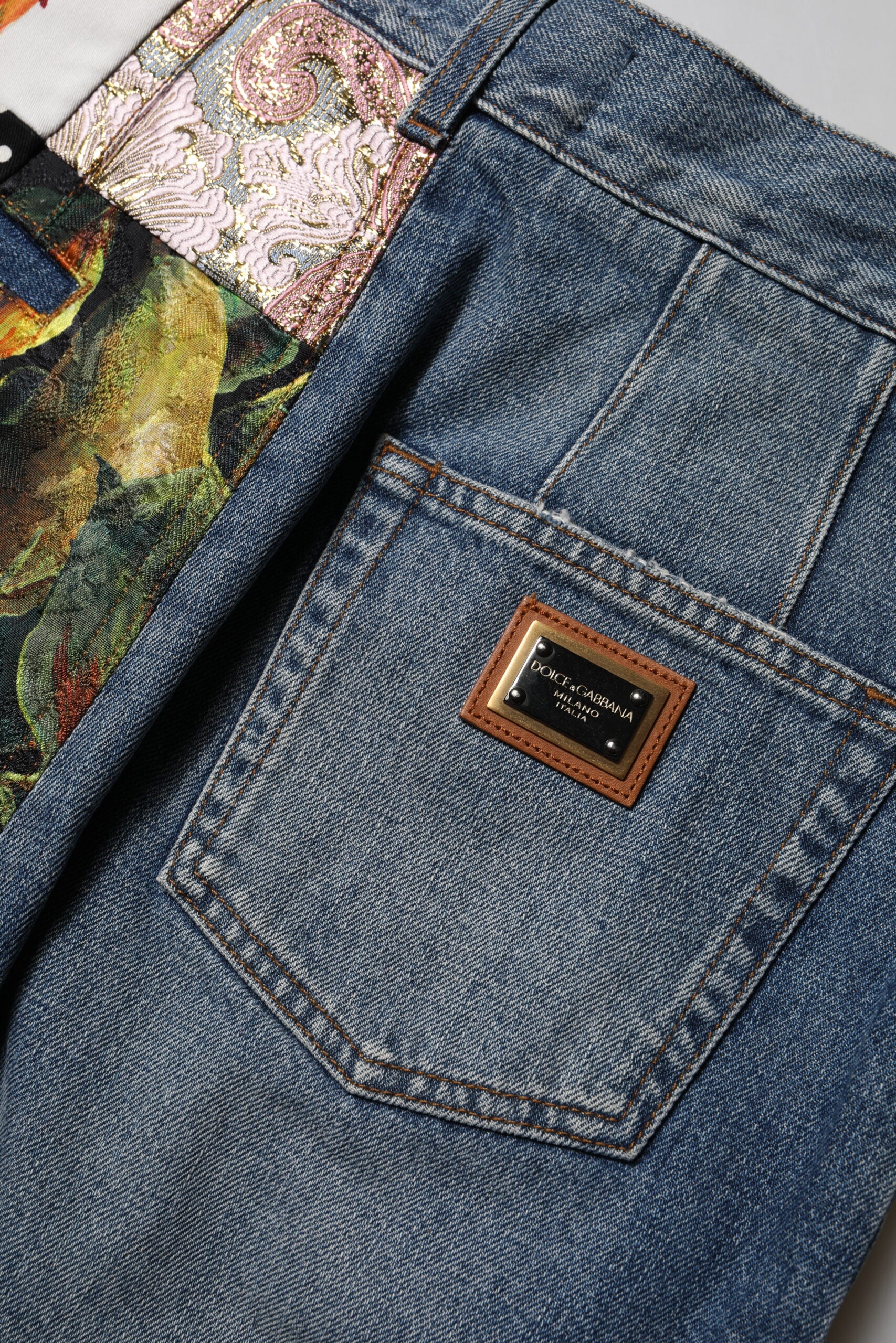 Indulge in the exquisite Dolce & Gabbana Blue AMBER Patchwork High Waist Denim Jeans, where Italian craftsmanship meets luxurious materials for a timeless statement.
