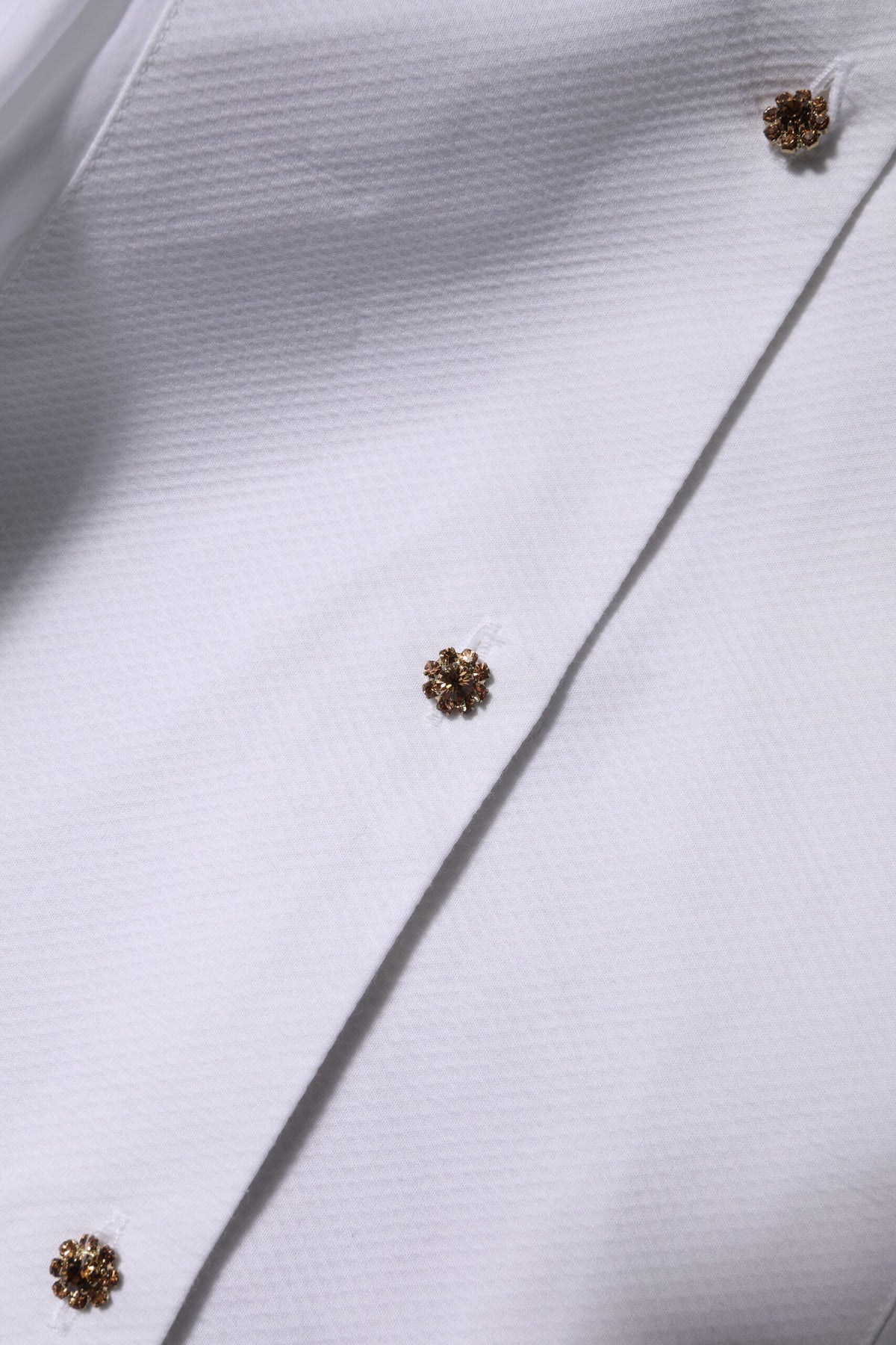Experience the allure of Dolce & Gabbana's White Cotton Long Sleeves Formal Top Shirt, a masterpiece of Italian craftsmanship that embodies timeless elegance and sophistication.