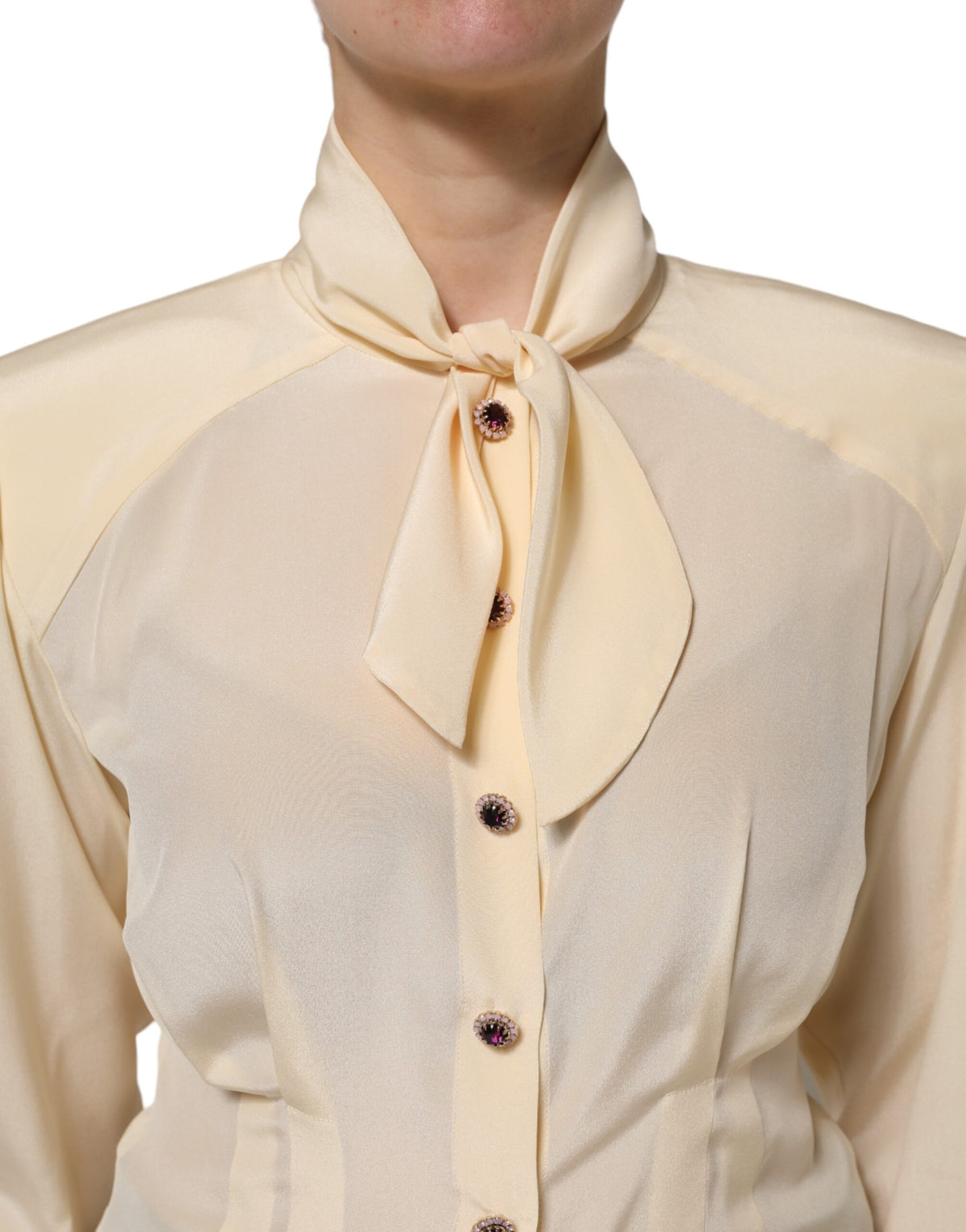 Indulge in the exquisite Dolce & Gabbana Light Yellow Ascot Collar Blouse, a silk masterpiece that embodies Italian elegance and elevates your sophisticated allure.