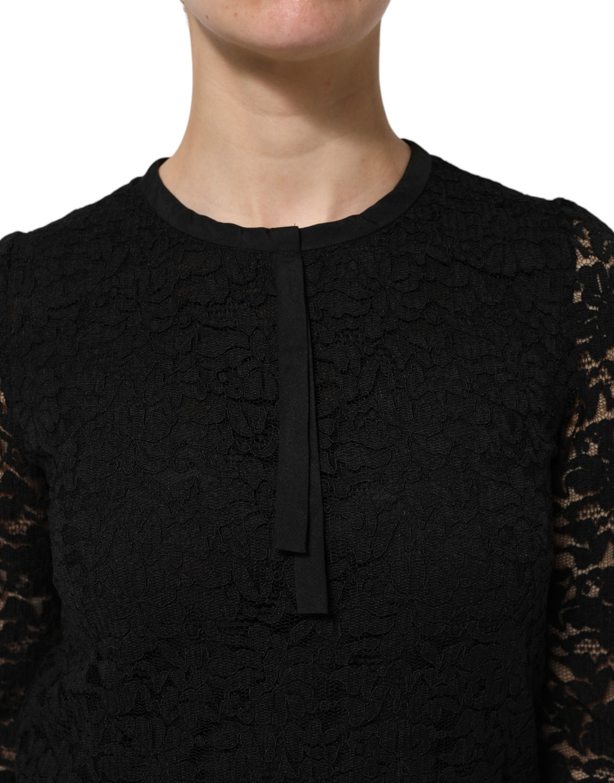 Elevate your wardrobe with the Dolce & Gabbana Black Nylon Lace Long Sleeve Blouse, a testament to Italian craftsmanship and timeless elegance, perfect for any occasion.
