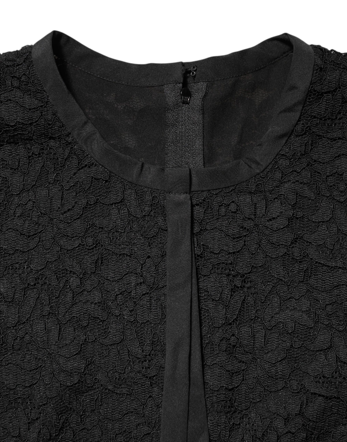 Elevate your wardrobe with the Dolce & Gabbana Black Nylon Lace Long Sleeve Blouse, a testament to Italian craftsmanship and timeless elegance, perfect for any occasion.