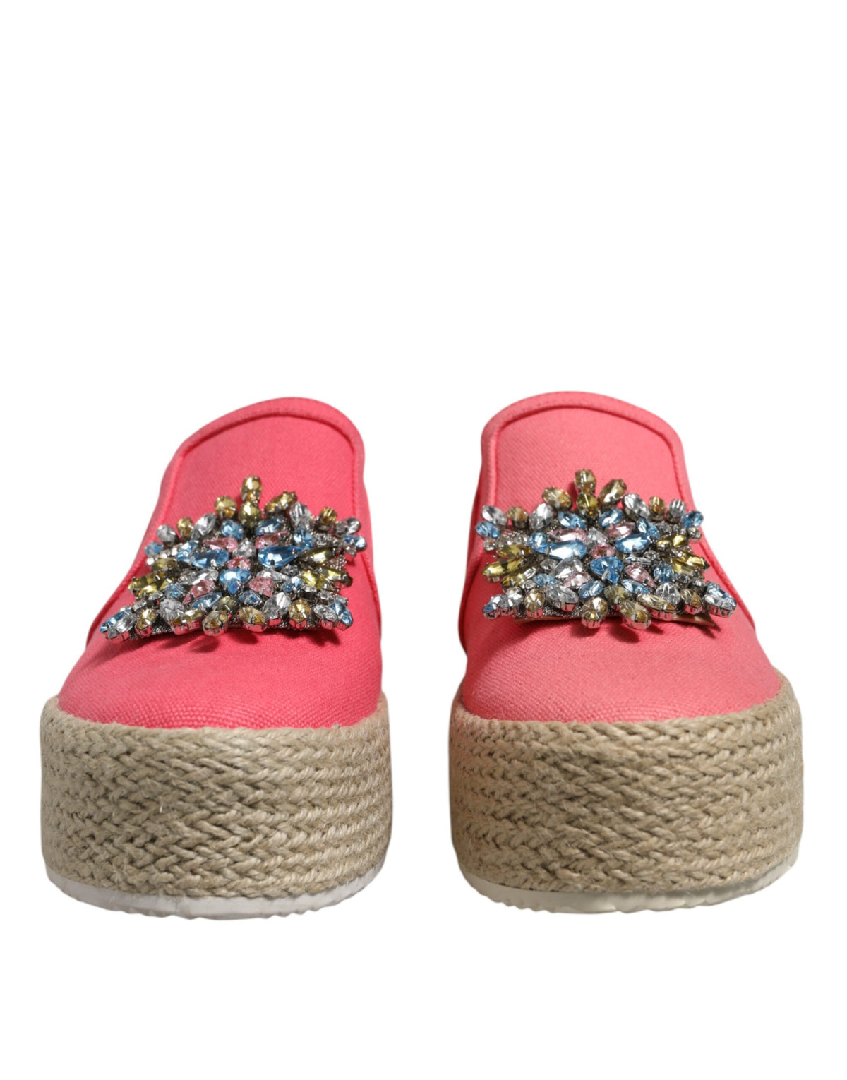 Experience the allure of Twinset's Pink Canvas Crystal Embellished Slip On Shoes, where exquisite craftsmanship meets timeless elegance, perfect for any discerning individual.