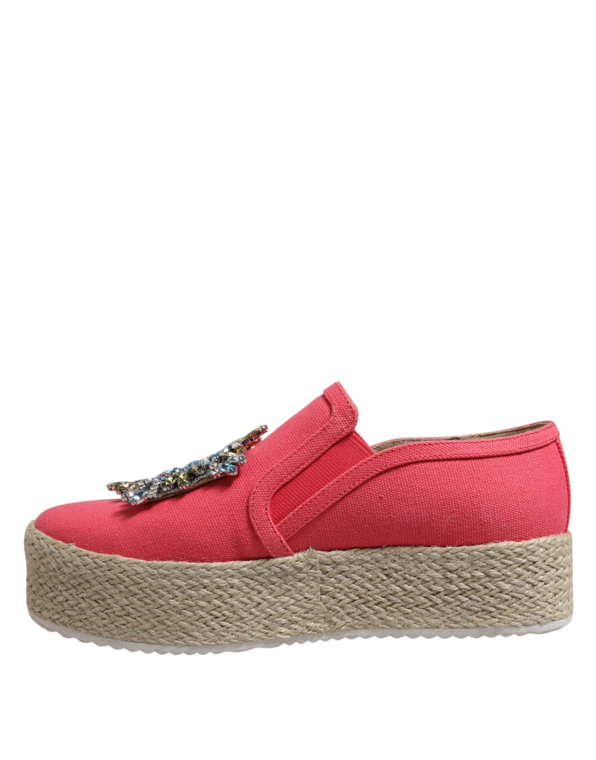 Elevate your style with Twinset's Pink Canvas Crystal Embellished Slip On Shoes, a testament to exquisite craftsmanship and timeless elegance for the discerning individual.