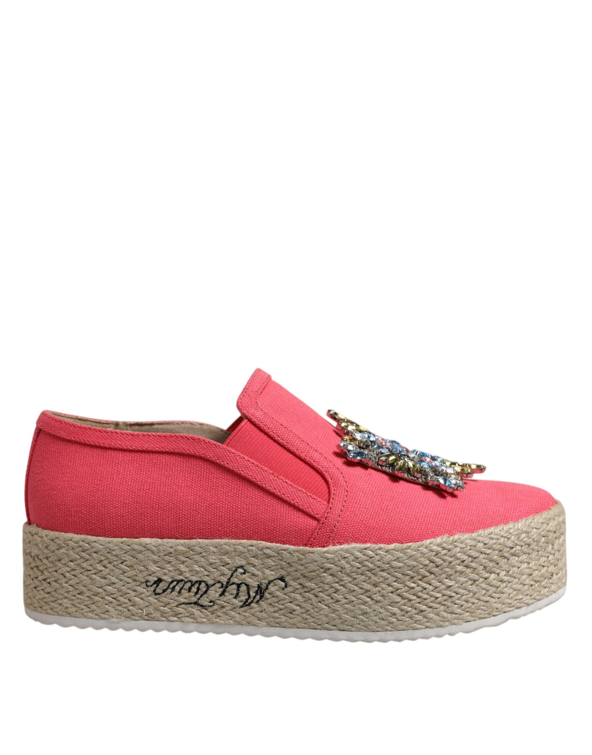 Experience the allure of Twinset's Pink Canvas Crystal Embellished Slip On Shoes, where exquisite craftsmanship meets timeless elegance for the discerning individual.