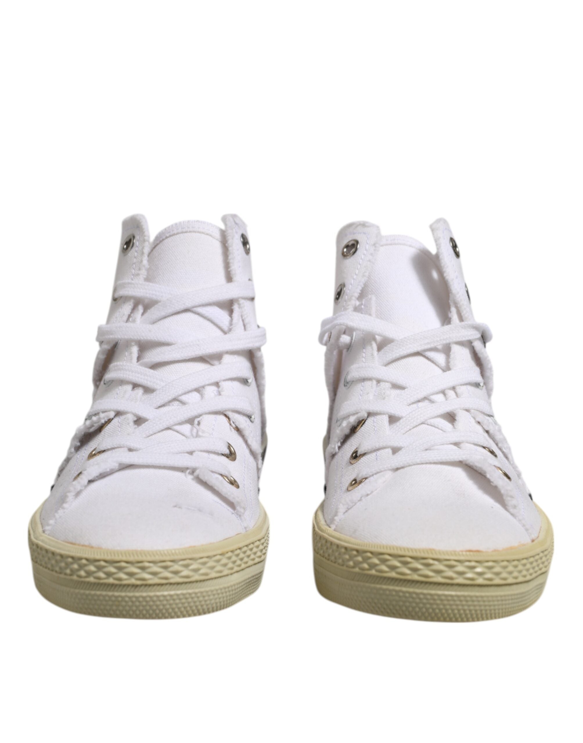 Discover the Maison Margiela White Lace Up Mid Top Sneakers, where premium canvas meets artisanal craftsmanship, elevating your style with unparalleled elegance.