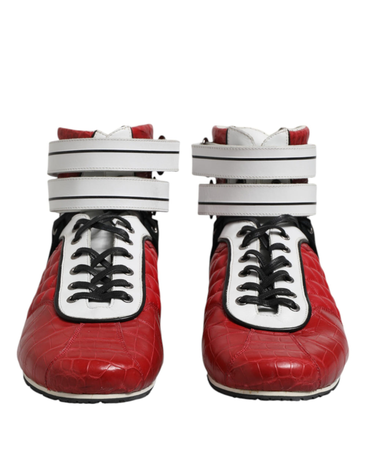 Experience the allure of Dolce & Gabbana Red Quilted Leather Lace Up Sneakers, where Italian craftsmanship meets striking elegance, perfect for the discerning modern individual.