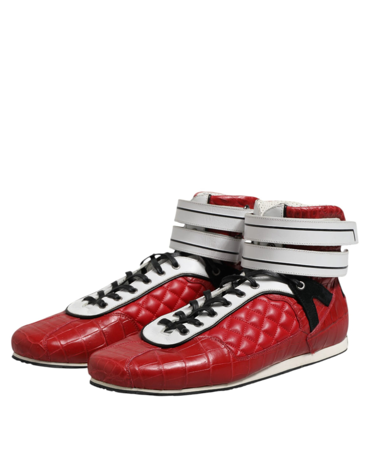 Experience the allure of Dolce & Gabbana Red Quilted Leather Lace Up Sneakers, where exquisite Italian craftsmanship meets timeless elegance for the discerning individual.