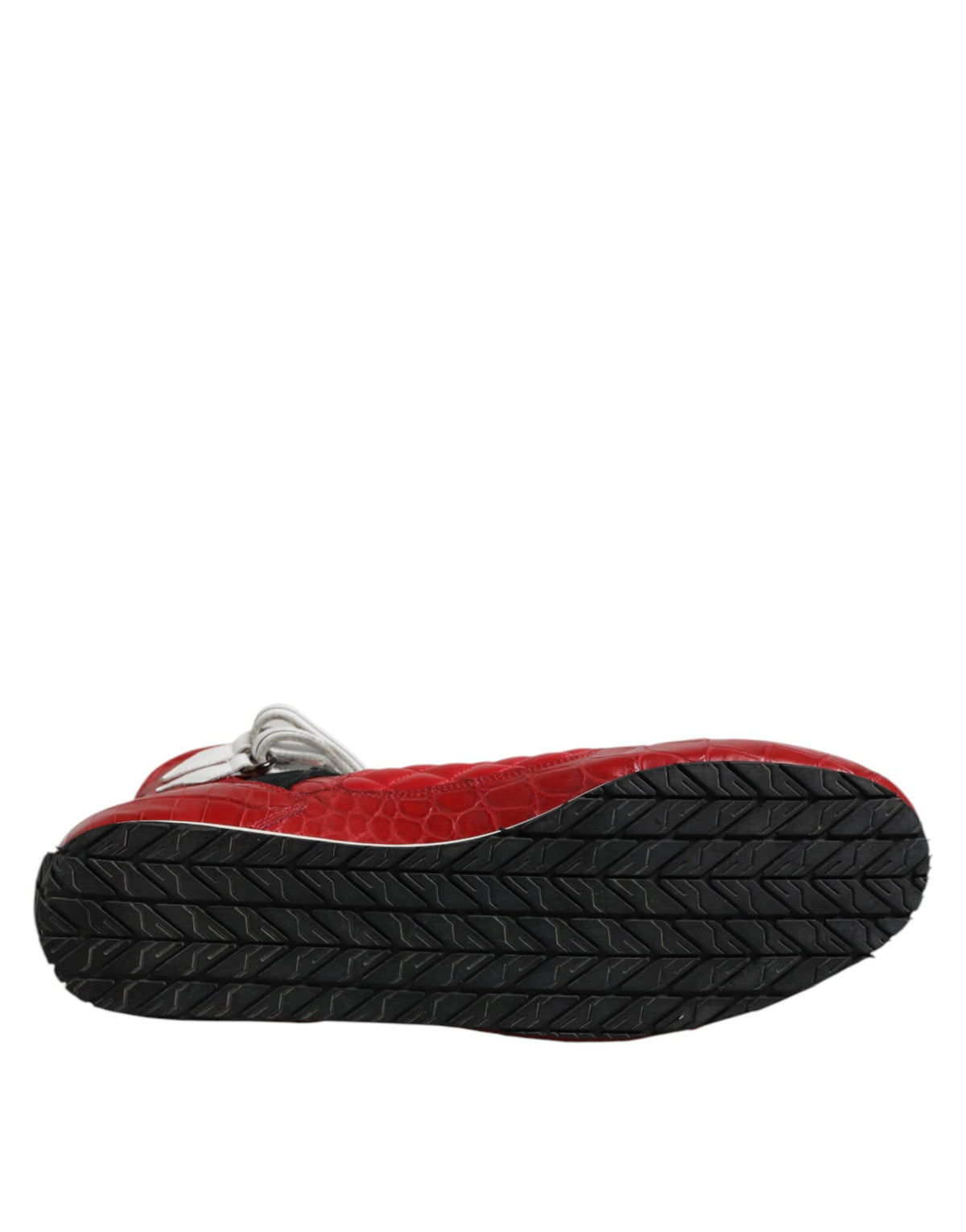 Step into a world of opulence with Dolce & Gabbana Red Quilted Leather Lace Up Sneakers, where exquisite Italian craftsmanship meets bold elegance for the discerning individual.