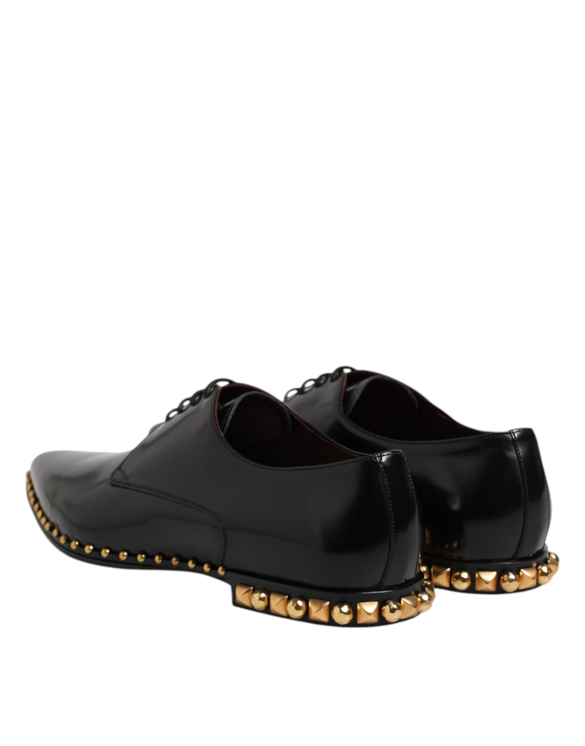 Indulge in the exquisite Dolce & Gabbana Black Leather Studded Derby Shoes, where luxurious calfskin craftsmanship meets timeless elegance, perfect for the discerning individual.