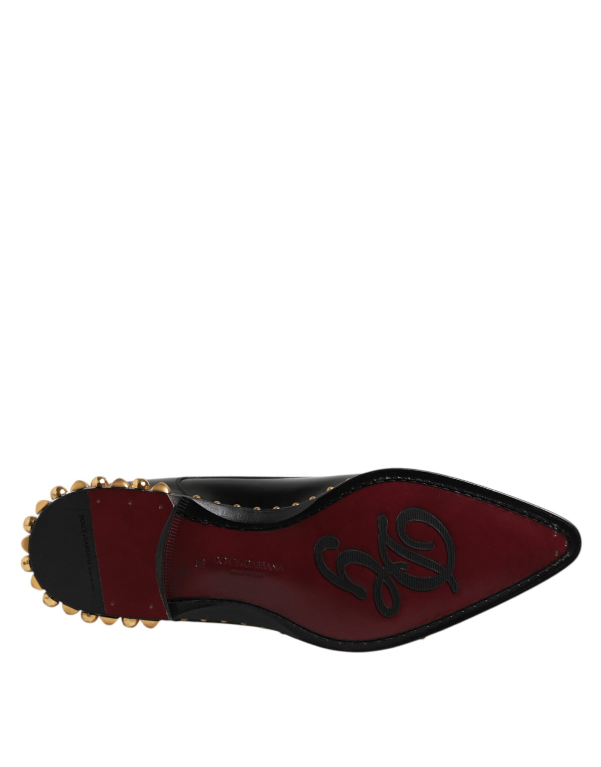 Indulge in the elegance of Dolce & Gabbana's Black Leather Studded Derby Shoes, crafted from exquisite calfskin for a timeless statement of luxury and sophistication.