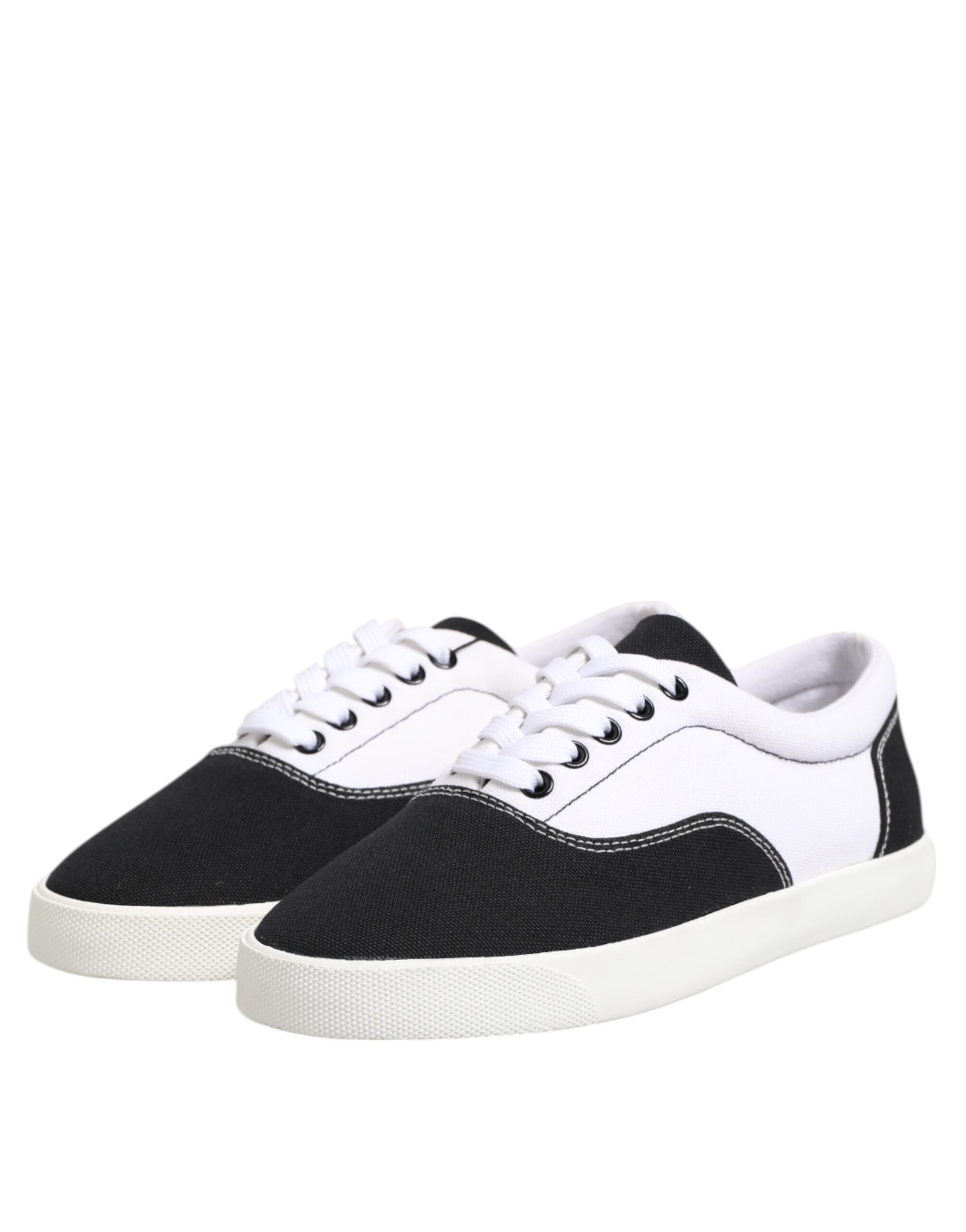 Elevate your style with Dolce & Gabbana's Black Cotton Canvas Lace Up Sneakers, where exquisite craftsmanship meets luxurious comfort for the discerning individual.