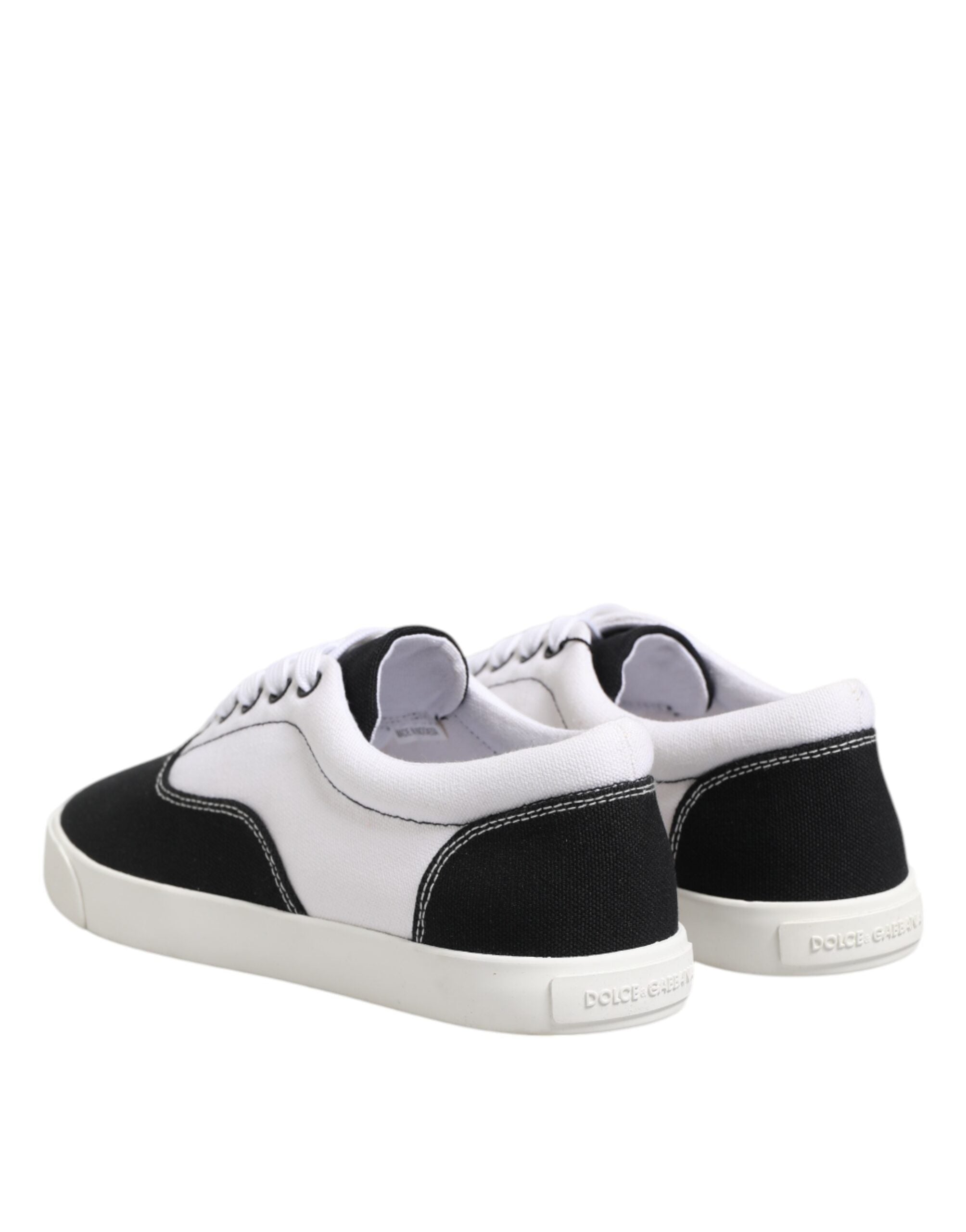 Indulge in the exquisite Dolce & Gabbana Black Cotton Canvas Lace Up Sneakers, where Italian craftsmanship meets luxurious comfort, perfect for the discerning connoisseur.