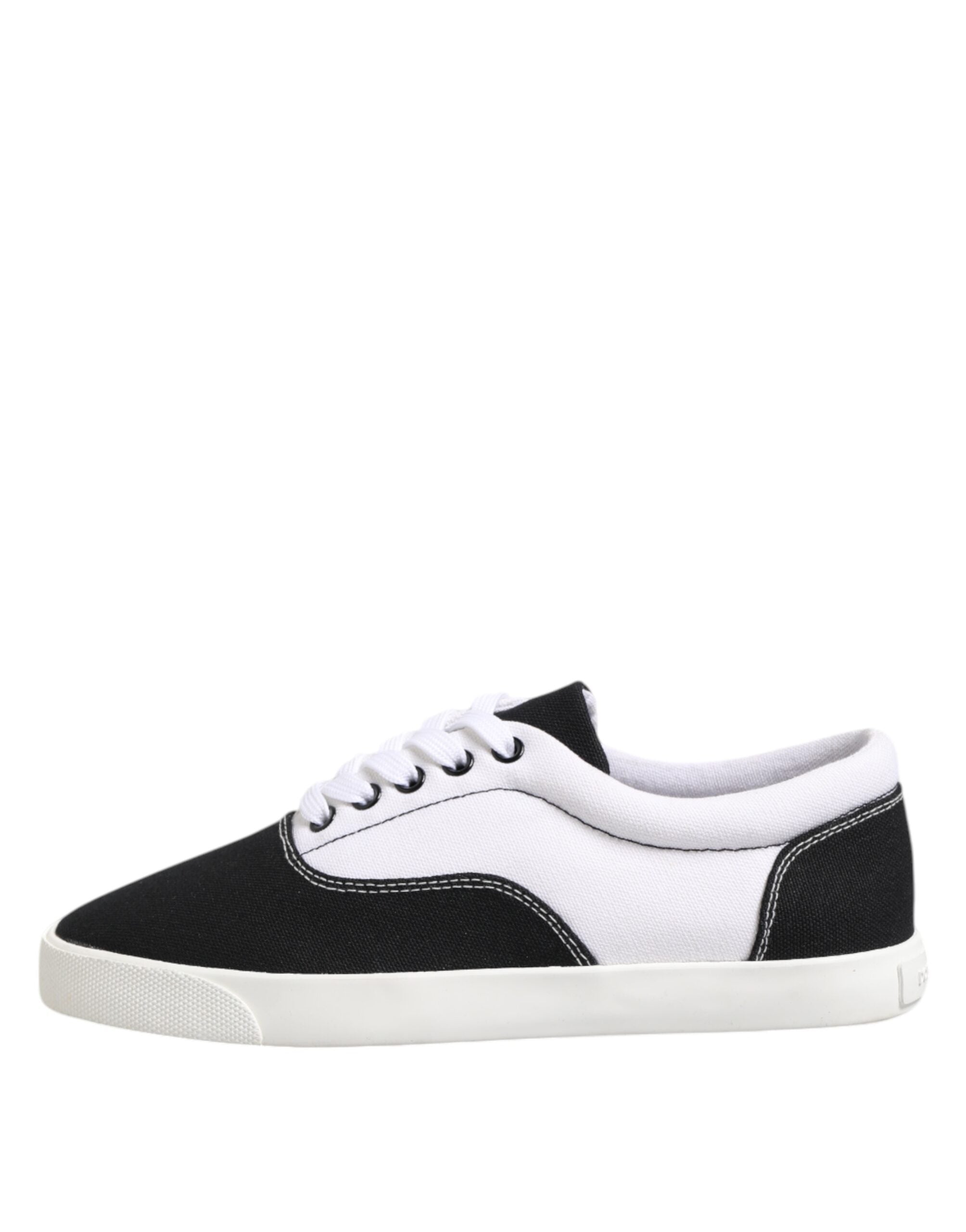 Experience the allure of Dolce & Gabbana's Black Cotton Canvas Lace Up Sneakers, where exquisite craftsmanship meets luxurious comfort, perfect for the discerning individual.