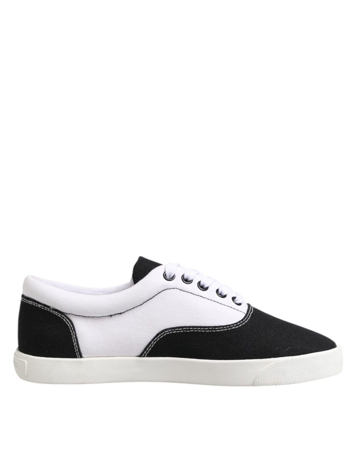 Experience the exquisite Dolce & Gabbana Black Cotton Canvas Lace Up Sneakers, where artisanal craftsmanship meets luxurious comfort for the discerning individual.