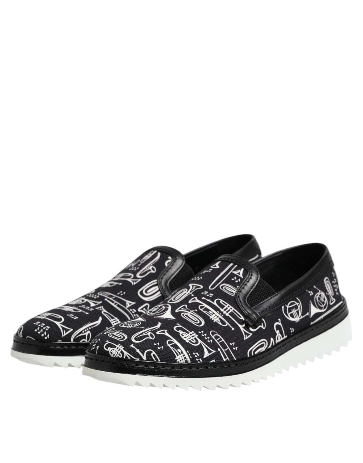 Step into elegance with Dolce & Gabbana Black Slip On Printed Men Loafers, crafted from premium cotton and leather, embodying luxury and sophistication for every occasion.