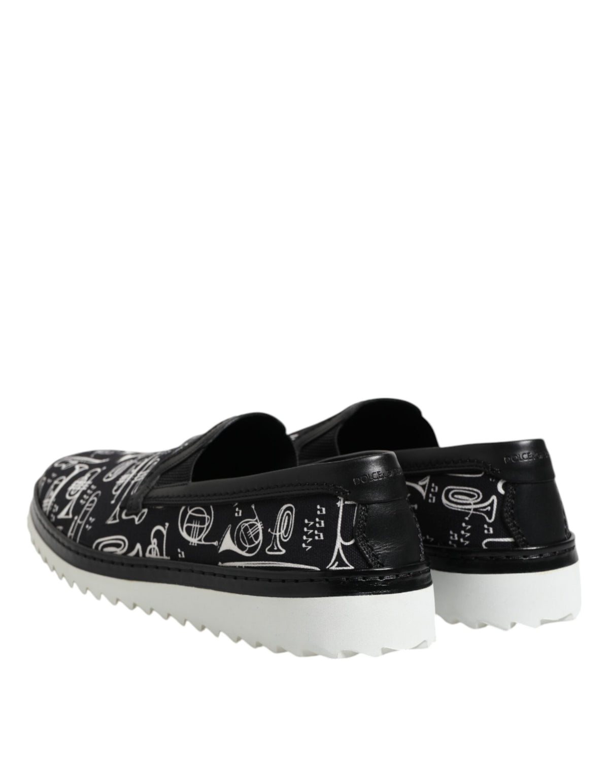 Experience the allure of Dolce & Gabbana Black Slip On Printed Men Loafers, where exquisite craftsmanship meets luxurious materials for a sophisticated style statement.