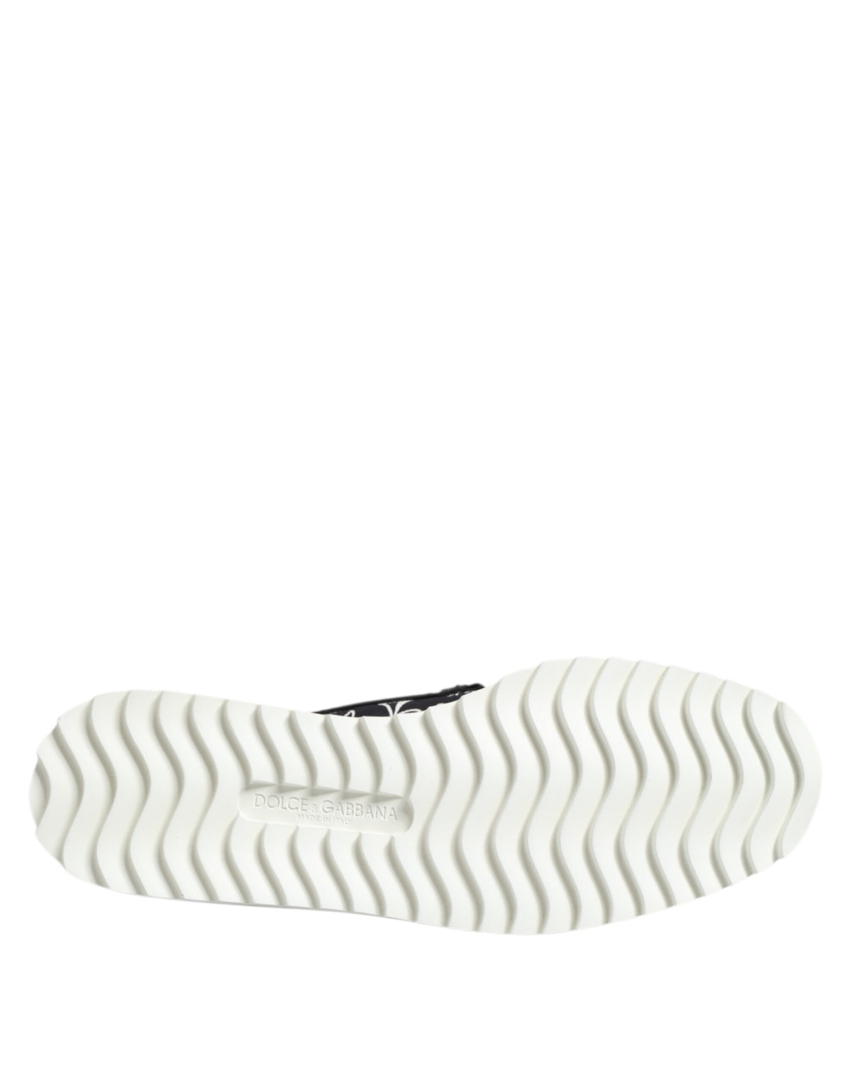 Experience the essence of luxury with Dolce & Gabbana Black Slip On Printed Men Loafers, crafted in Italy from premium cotton and leather for timeless elegance.