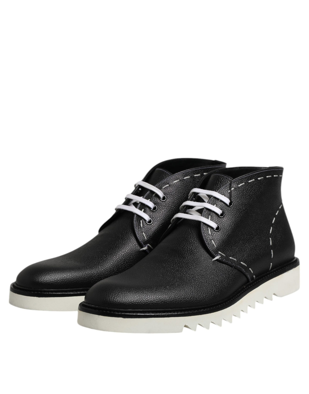 Indulge in the exquisite Dolce & Gabbana Black White Leather Ankle Boots, where artisanal craftsmanship meets timeless elegance, elevating your style to unparalleled heights.