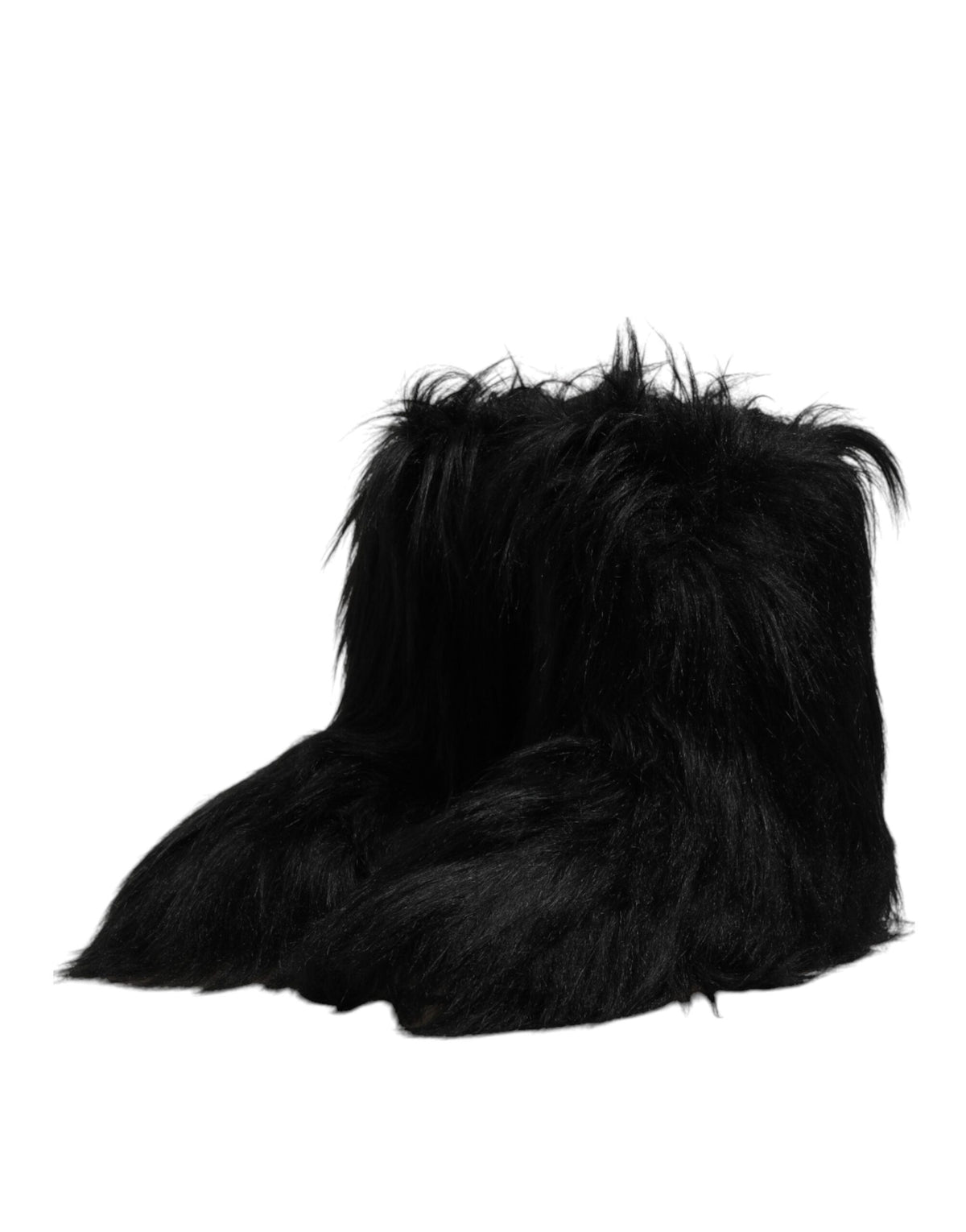 Step into the realm of luxury with Dolce & Gabbana's Black Faux Fur Mid Calf Boots, where exquisite craftsmanship meets timeless elegance for the discerning individual.