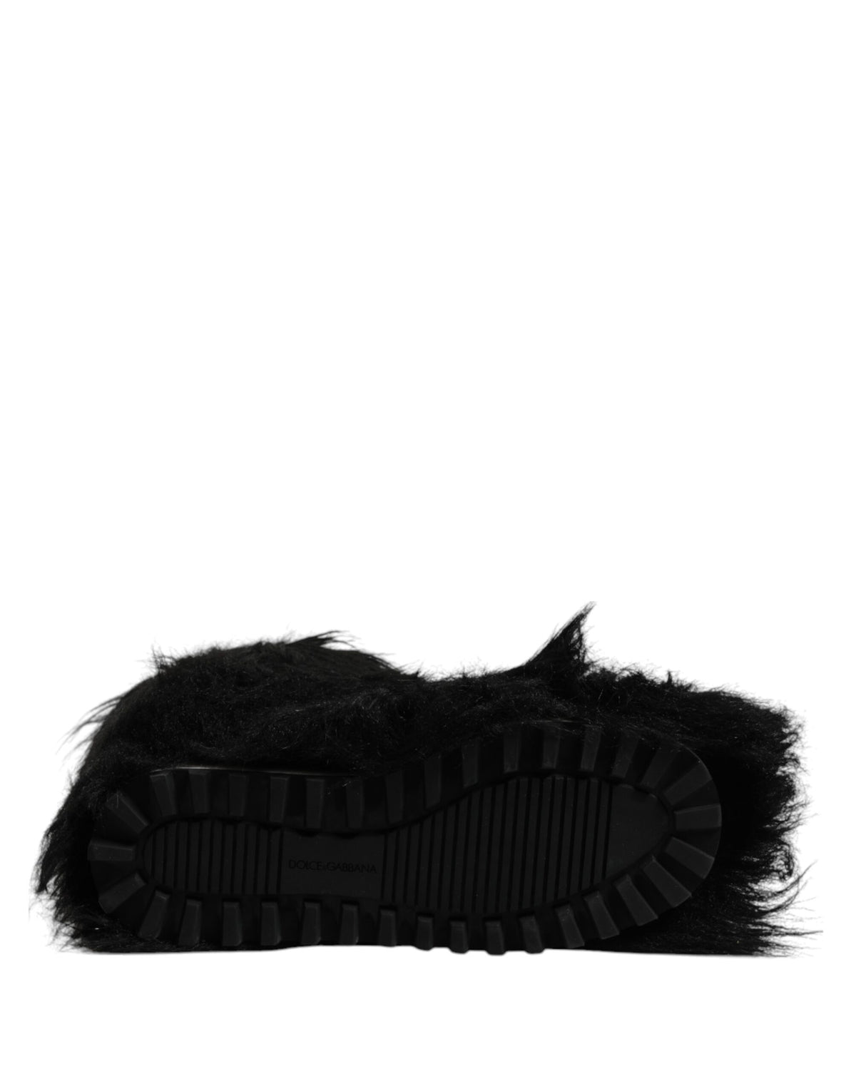 Indulge in the sumptuous allure of Dolce & Gabbana Black Faux Fur Mid Calf Boots, where exquisite Italian craftsmanship meets timeless elegance for the discerning connoisseur.