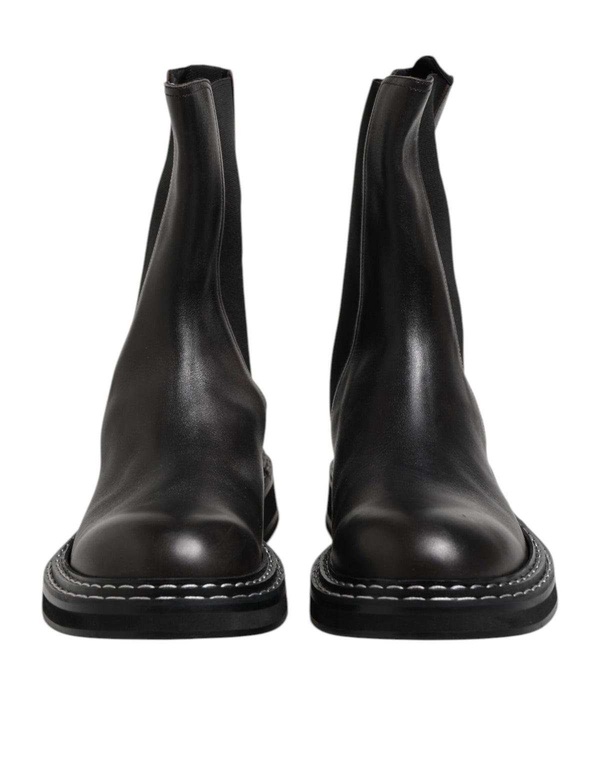 Step into the allure of Dolce & Gabbana's Black Leather Mid Calf Boots, where exquisite calf leather meets timeless sophistication, elevating your style with Italian luxury.