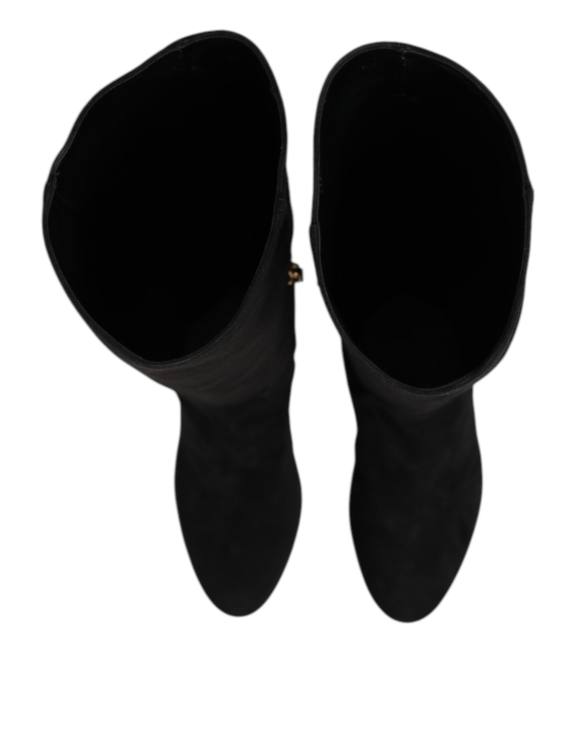 Indulge in the exquisite allure of Dolce & Gabbana's Black Suede Leather Knee High Boots, a masterpiece of Italian craftsmanship that elevates your style with unmatched elegance.