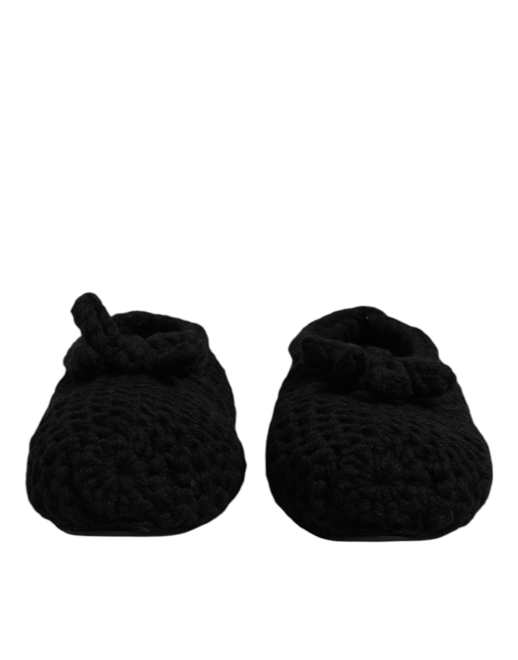Experience the exquisite allure of Dolce & Gabbana's Black Wool Slip On Flats, a timeless blend of Italian craftsmanship and luxurious elegance for the discerning individual.