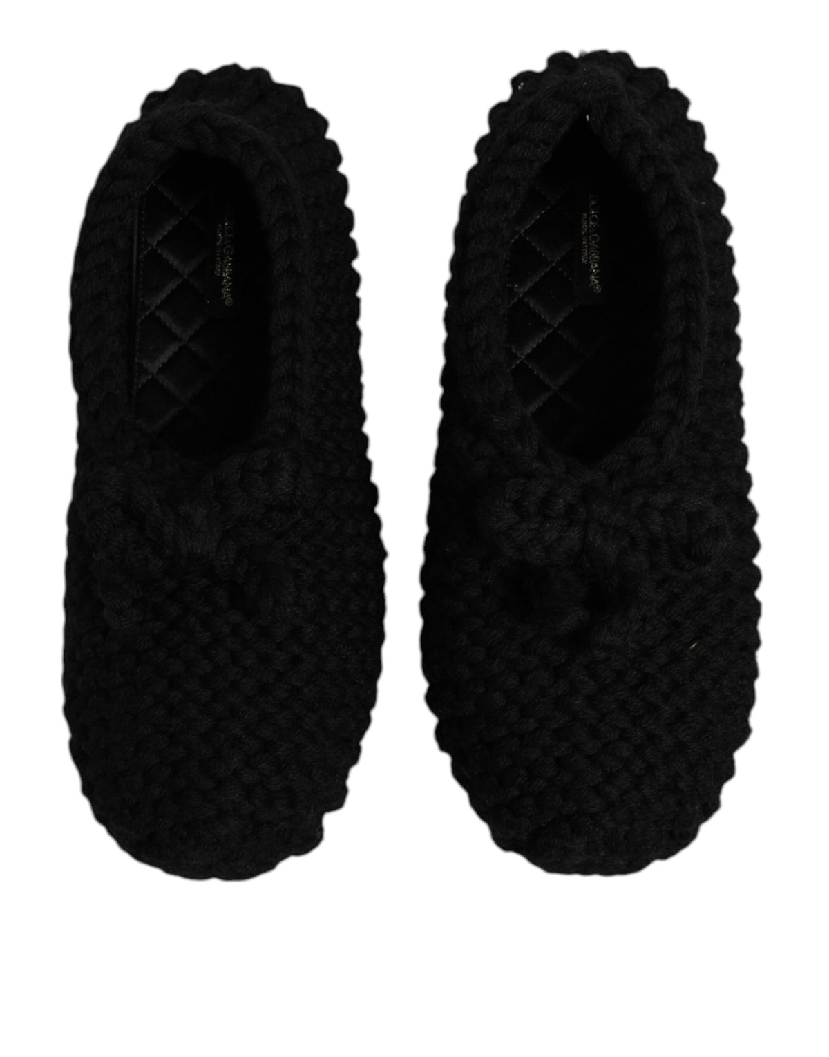 Step into timeless sophistication with Dolce & Gabbana's Black Wool Slip On Flats, where exquisite Italian craftsmanship meets luxurious comfort for the discerning individual.
