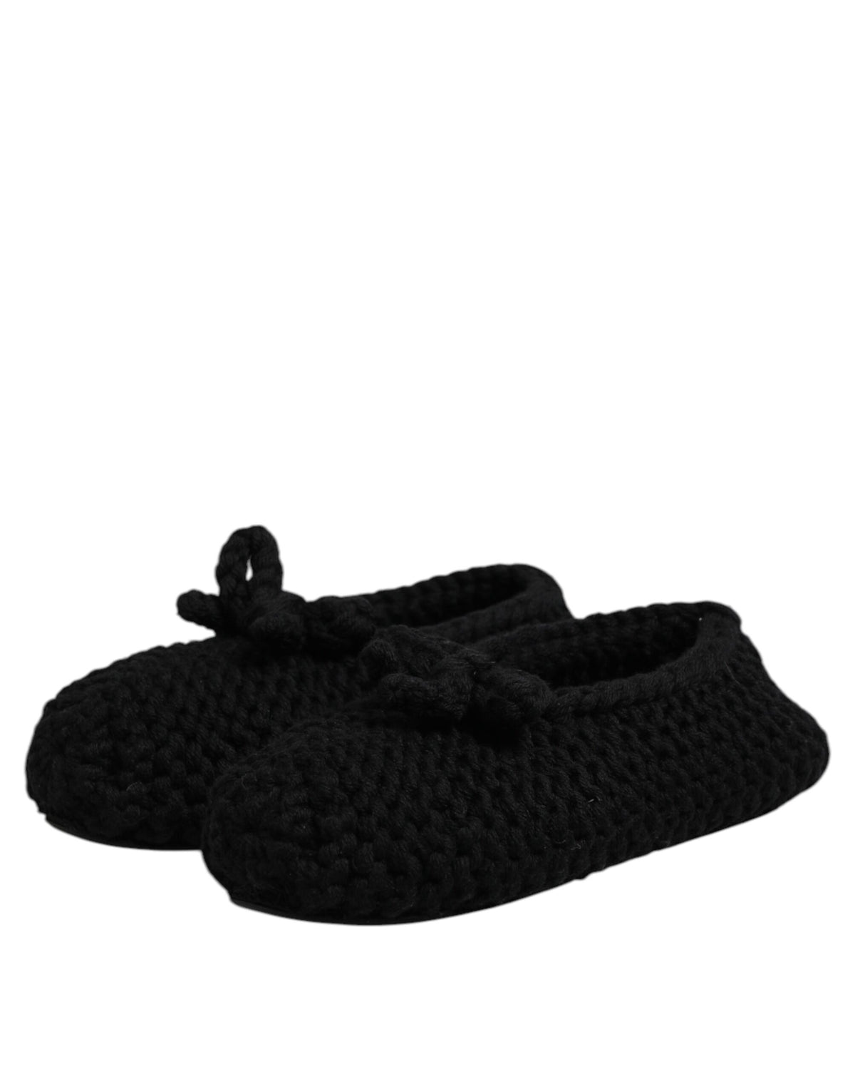 Experience the exquisite allure of Dolce & Gabbana's Black Wool Slip On Flats, crafted in Italy from luxurious materials, embodying timeless elegance for the discerning individual.