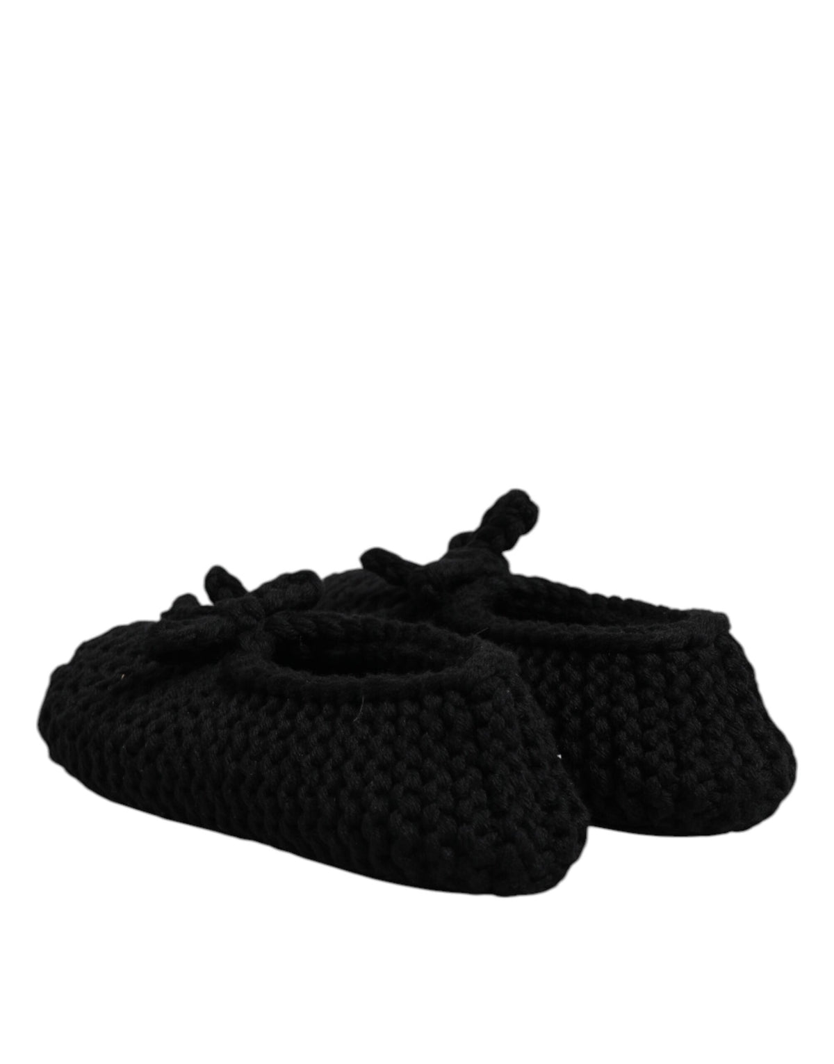 Experience the allure of Dolce & Gabbana's Black Wool Slip On Flats, where exquisite Italian craftsmanship meets timeless elegance, perfect for the discerning individual.