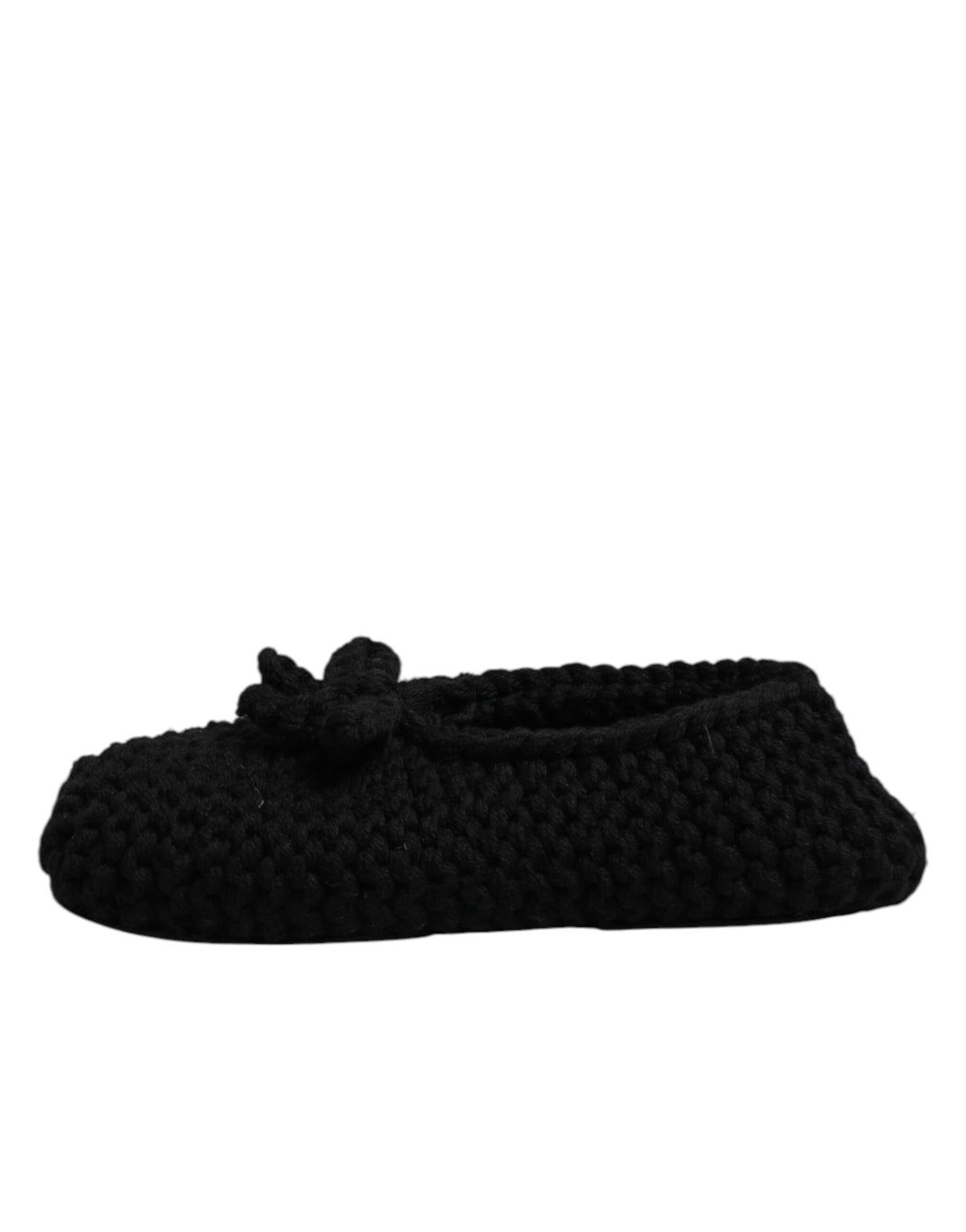 Experience the exquisite allure of Dolce & Gabbana's Black Wool Slip On Flats, crafted in Italy from the finest materials, embodying timeless elegance and luxurious sophistication.