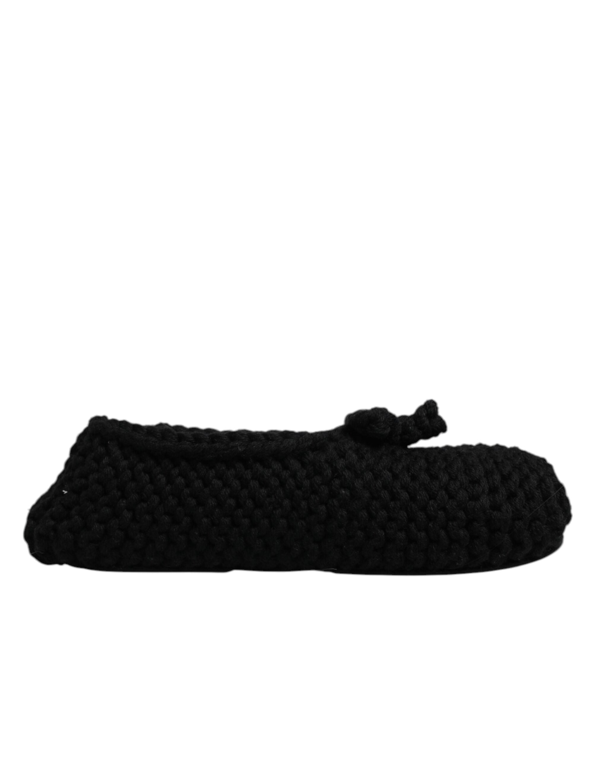 Experience the exquisite allure of Dolce & Gabbana's Black Wool Slip On Flats, crafted in Italy from luxurious materials, embodying timeless elegance for the discerning individual.