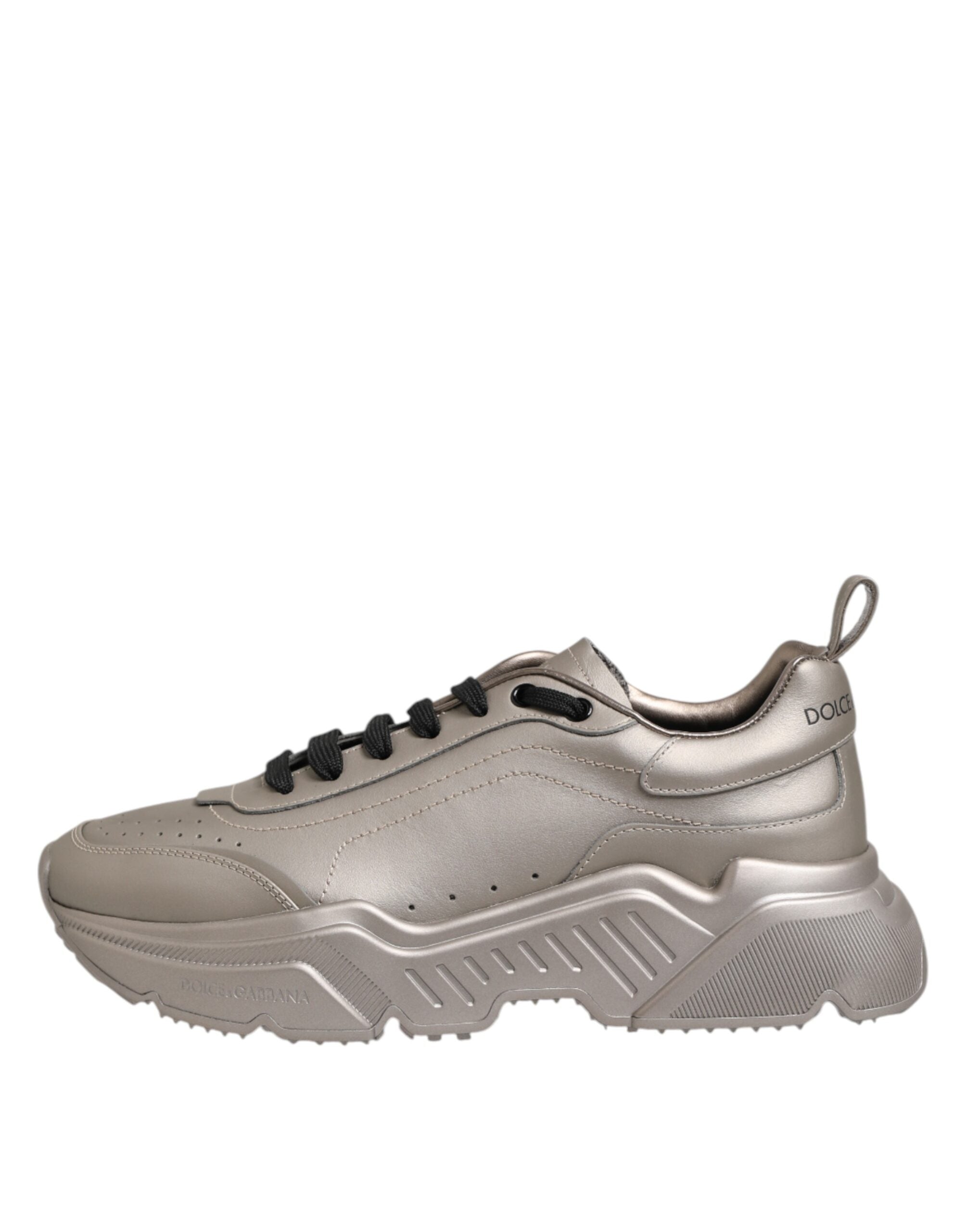 Elevate your style with Dolce & Gabbana Silver DAYMASTER sneakers, crafted from premium calf leather, embodying luxury and sophistication for the discerning connoisseur.