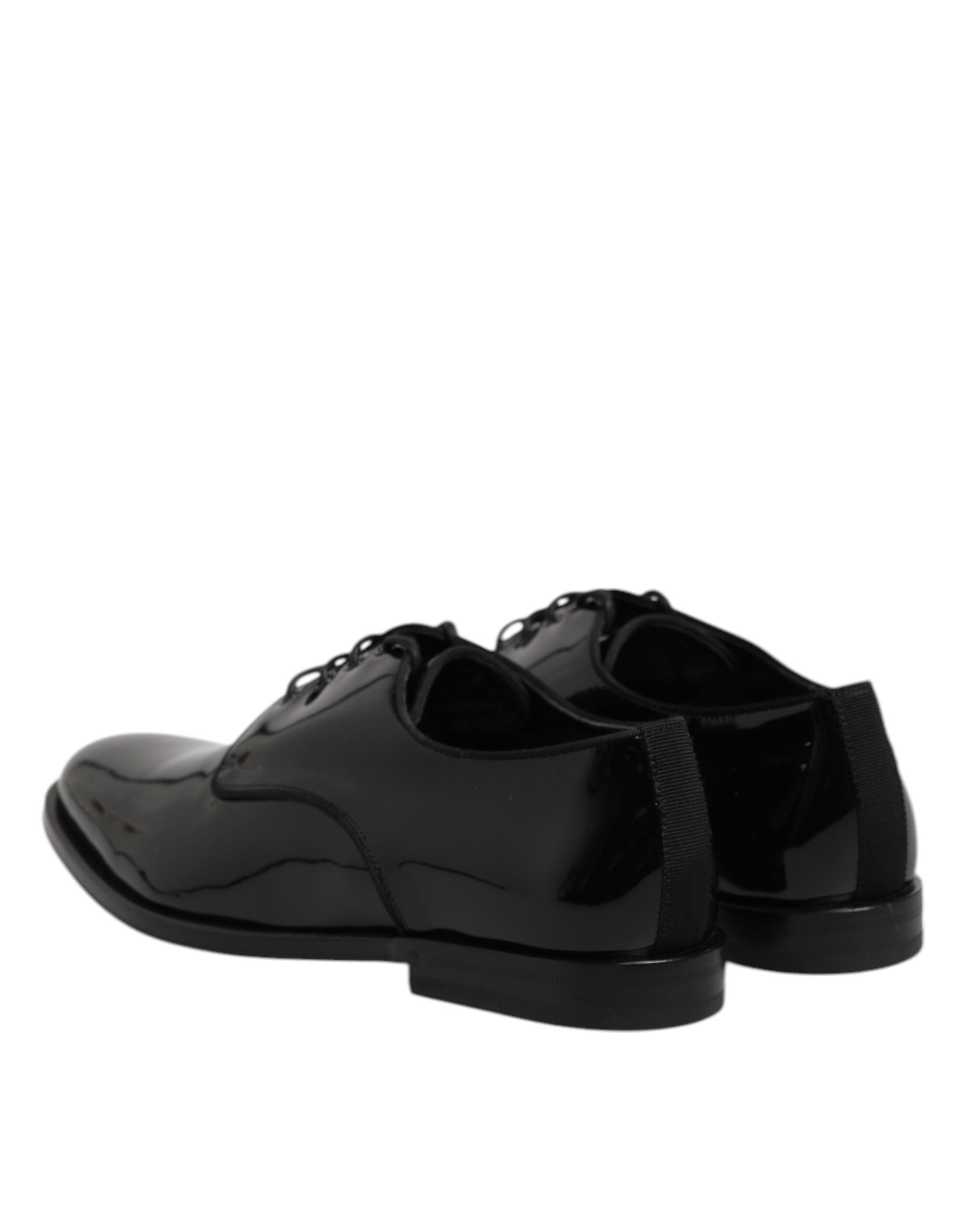 Elevate your style with Dolce & Gabbana's Black Patent Leather Derby Formal Dress Shoes, a testament to Italian craftsmanship and timeless elegance for the discerning individual.