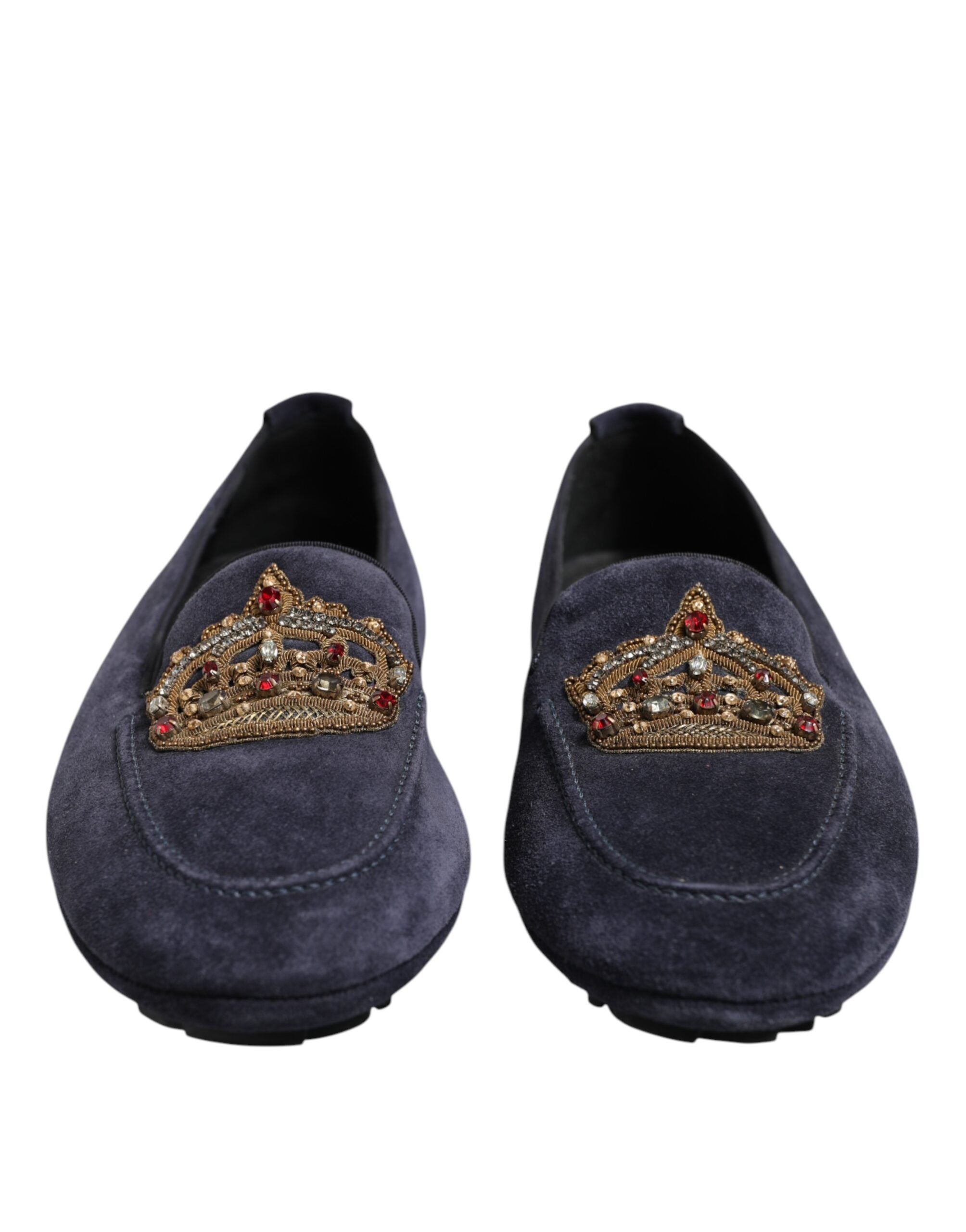 Indulge in the exquisite Dolce & Gabbana Blue Suede Crown Crystal Loafers, where Italian craftsmanship meets luxurious materials, elevating your style with unparalleled elegance.