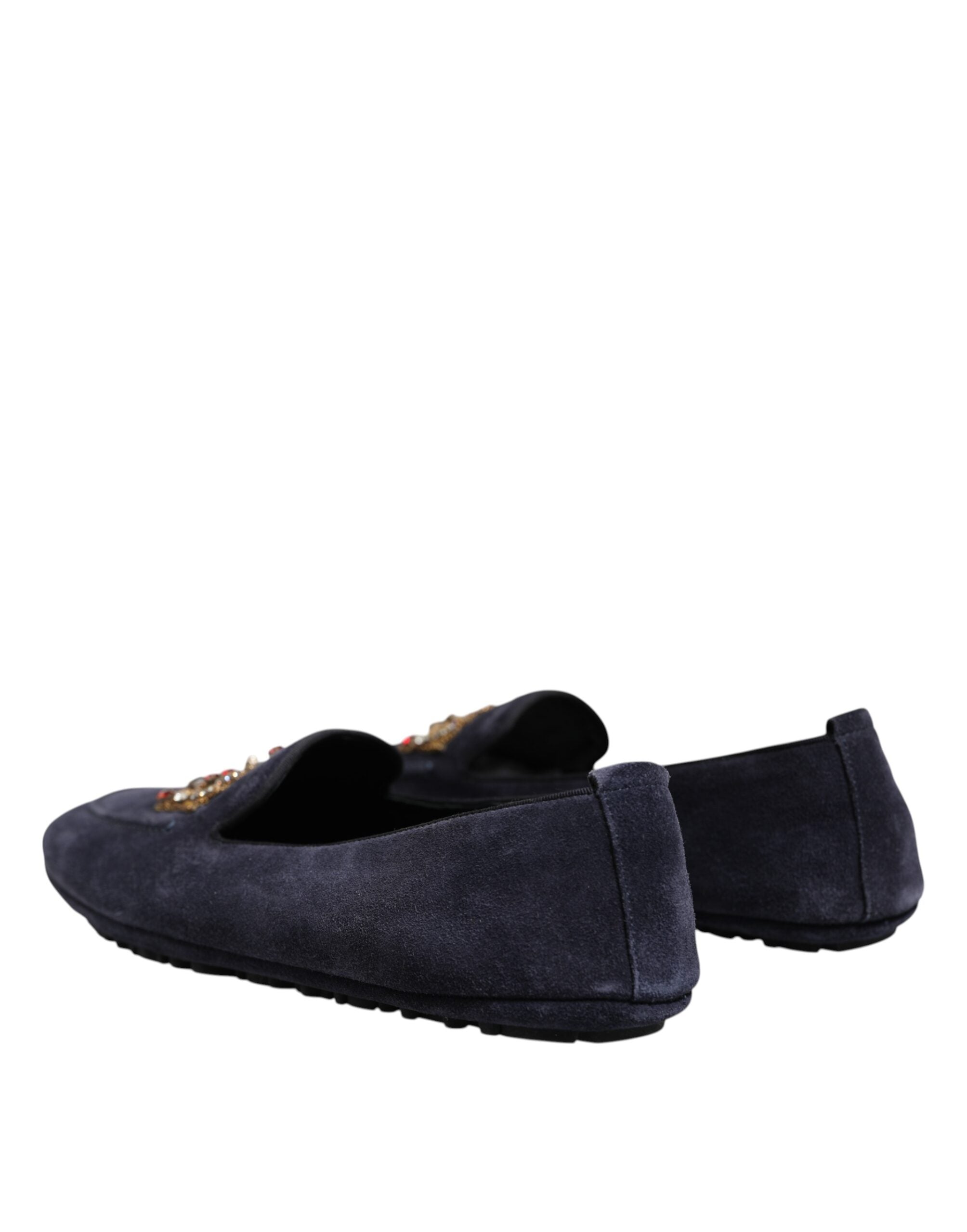 Experience the exquisite allure of Dolce & Gabbana Blue Suede Crown Crystal Loafers, a testament to Italian craftsmanship that elevates your style with luxurious elegance.