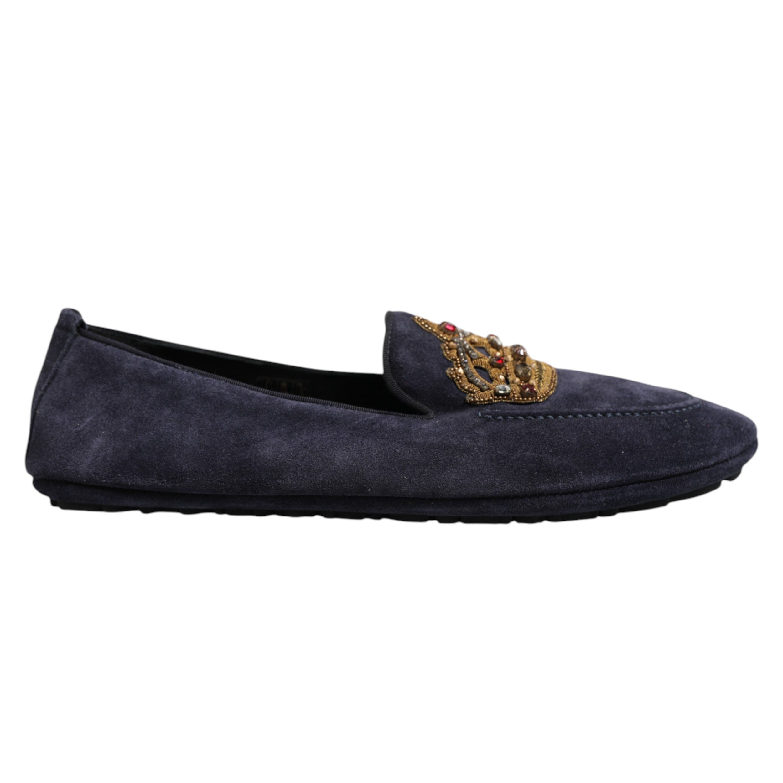 Indulge in the exquisite craftsmanship of Dolce & Gabbana Blue Suede Crown Crystal Loafers, where luxurious materials meet timeless elegance for the discerning individual.
