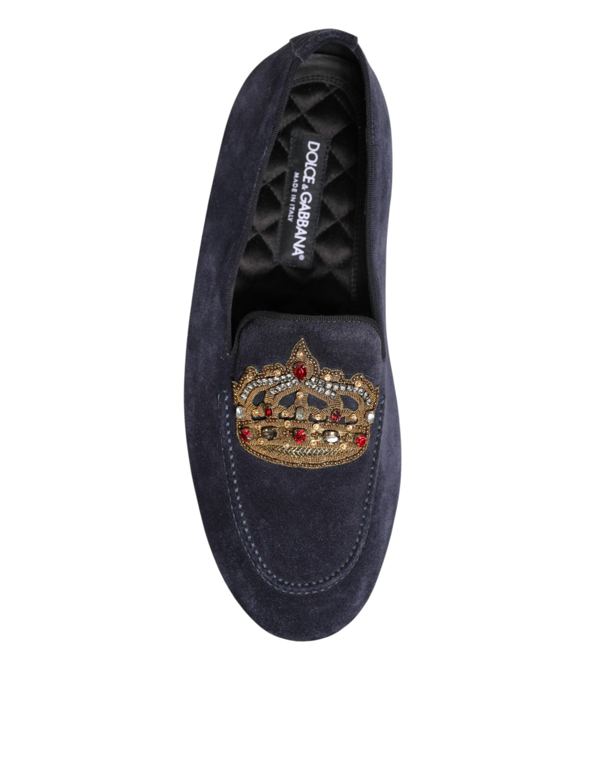 Elevate your style with Dolce & Gabbana Blue Suede Crown Crystal Loafers, a masterpiece of Italian craftsmanship that embodies luxury and individuality for the discerning wearer.