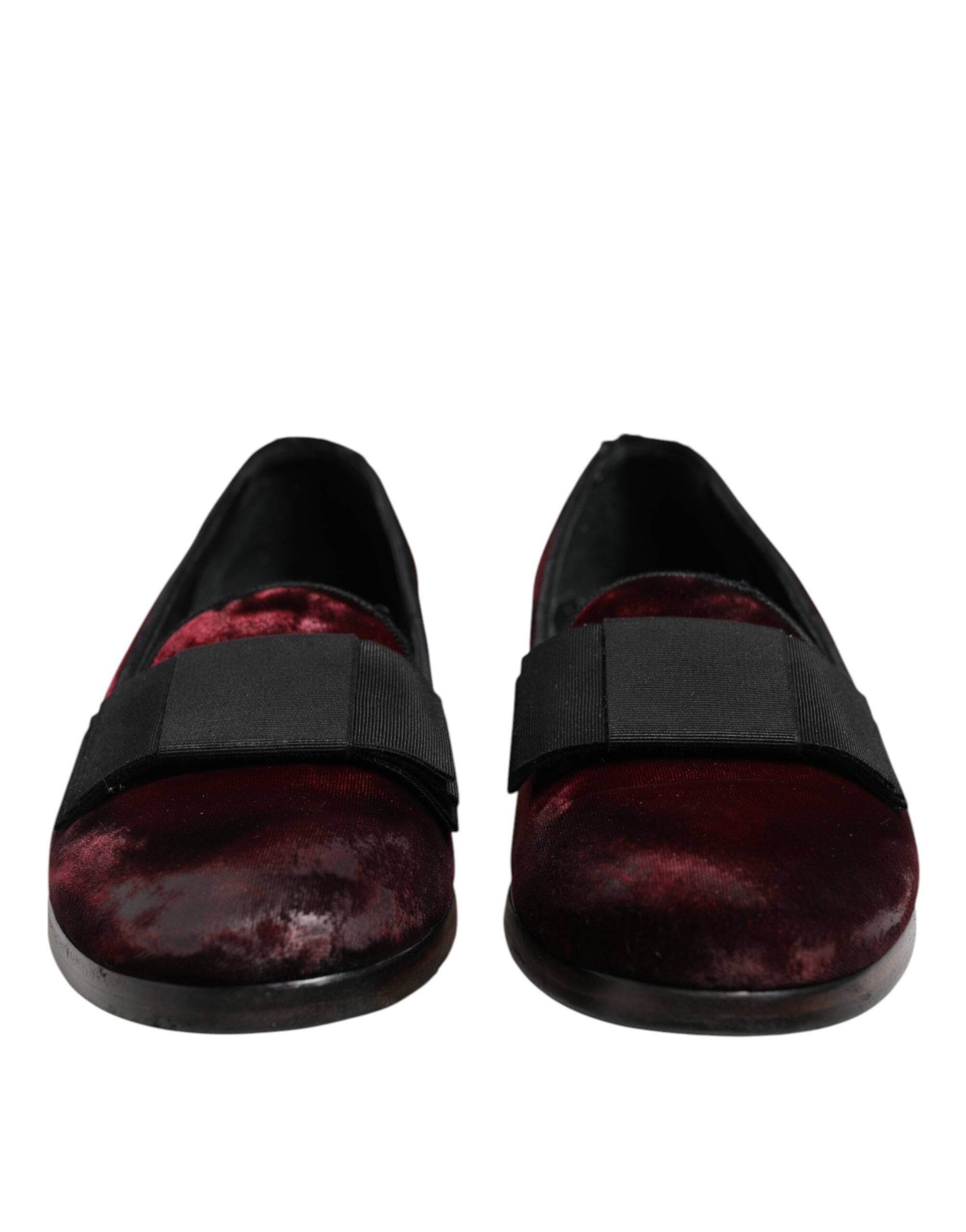 Step into sophistication with Dolce & Gabbana Red Velvet Men Slip On Loafers, where luxurious leather meets timeless Italian craftsmanship for the discerning individual.