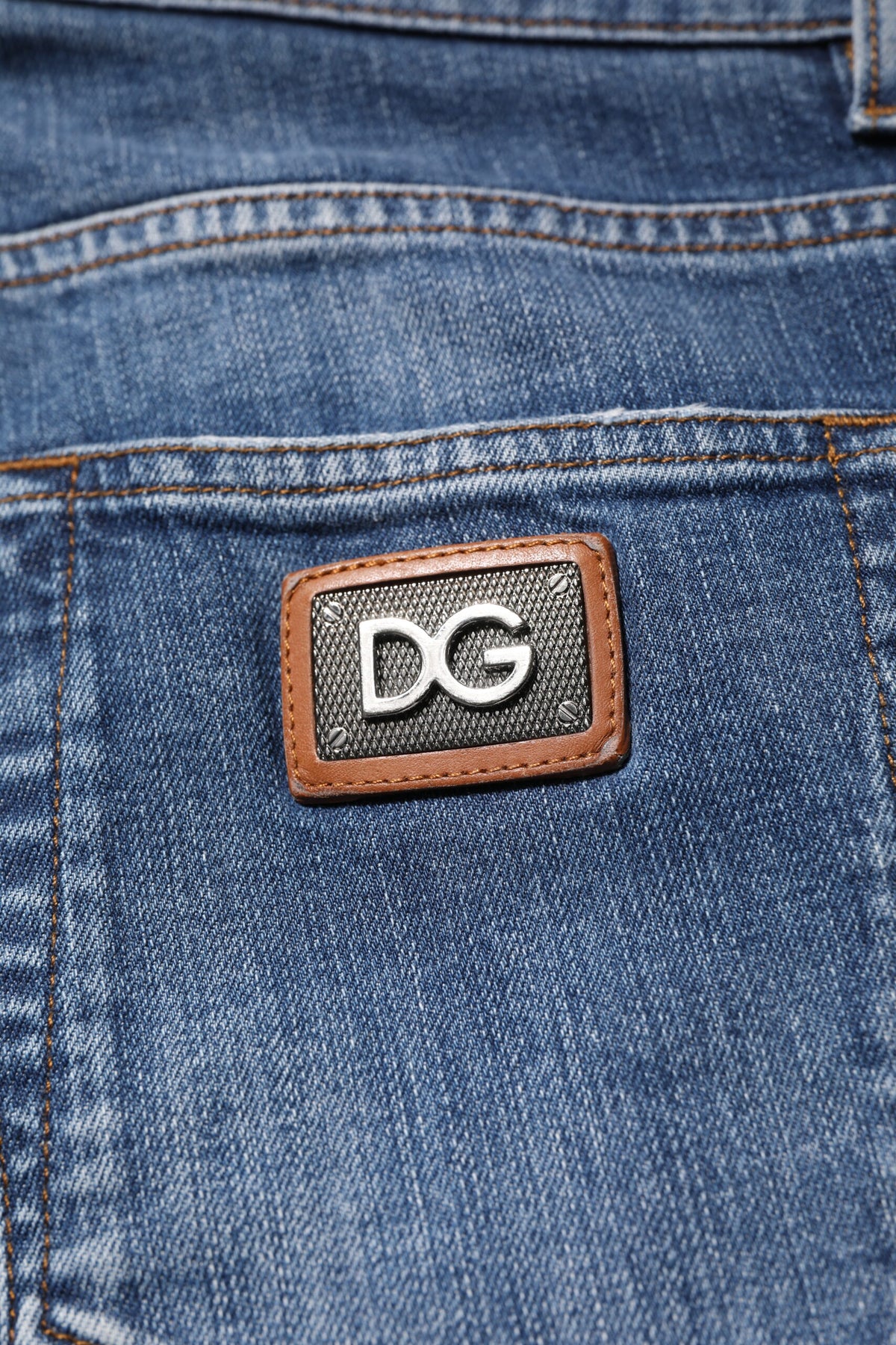 Dolce & Gabbana Blue Cotton Logo Plaque Denim Jeans - Luxury Redefined