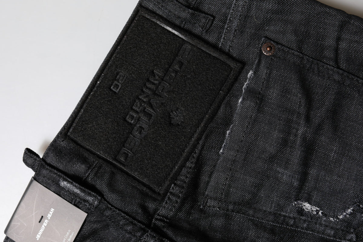 Indulge in the exquisite craftsmanship of Dsquared²'s black cotton low waist skinny jeans, a luxurious blend of comfort and sophistication for the discerning individual.