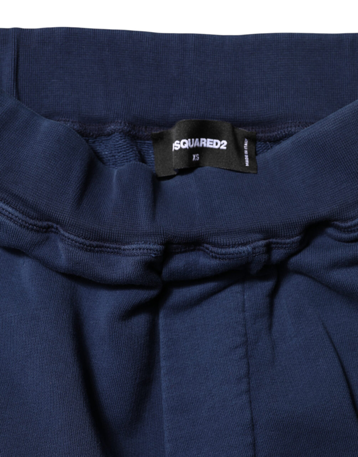 Indulge in the exquisite craftsmanship of Dsquared²'s Blue Cotton Mid Waisted Jogger Pants, where luxurious comfort meets refined elegance for the modern connoisseur.