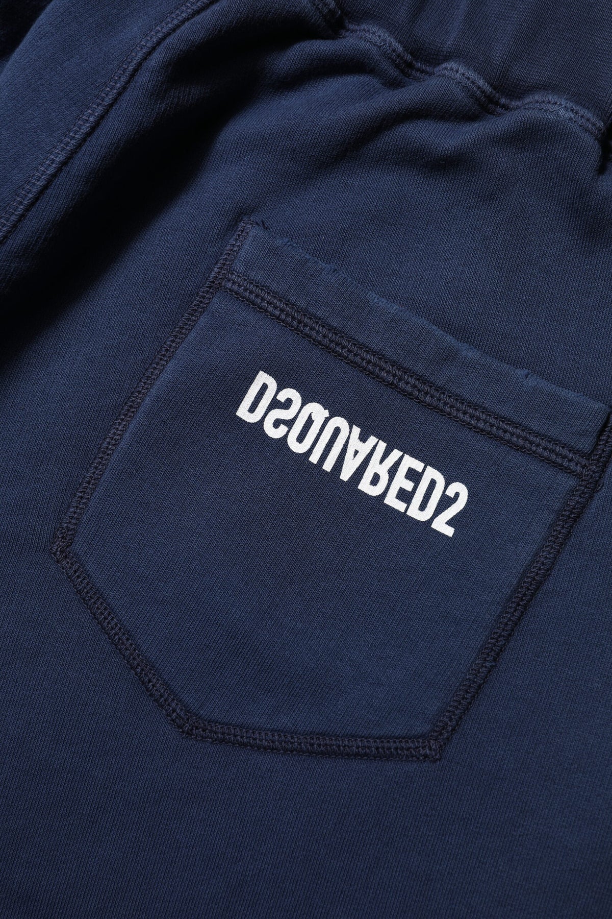 Experience the exquisite craftsmanship of Dsquared²'s Blue Cotton Mid Waisted Jogger Pants, where luxurious comfort meets refined elegance for a sophisticated lifestyle.