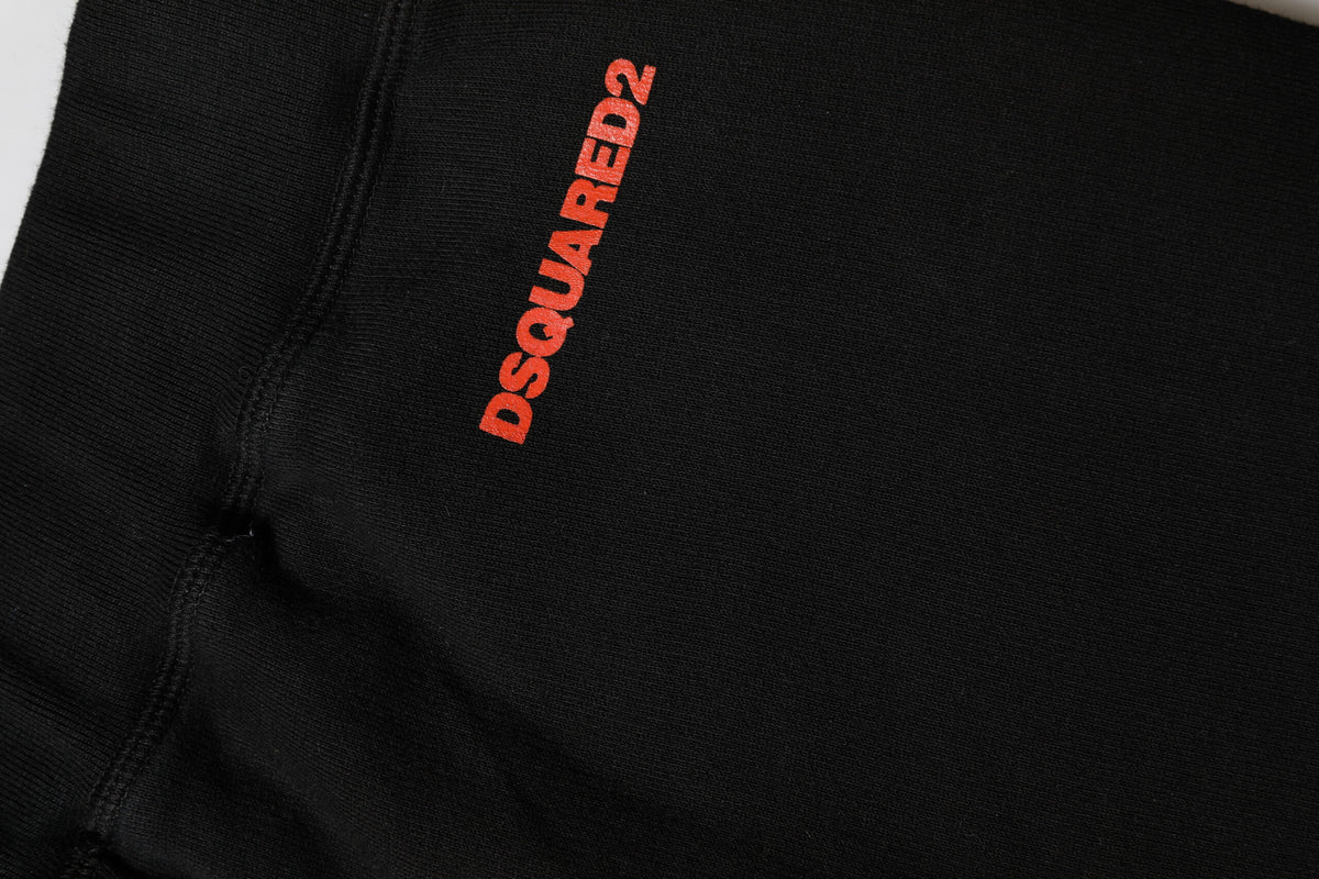 Indulge in the exquisite craftsmanship of Dsquared² Black Red Cotton Straight Fit Jogger Pants, where luxurious comfort meets avant-garde elegance for the discerning individual.