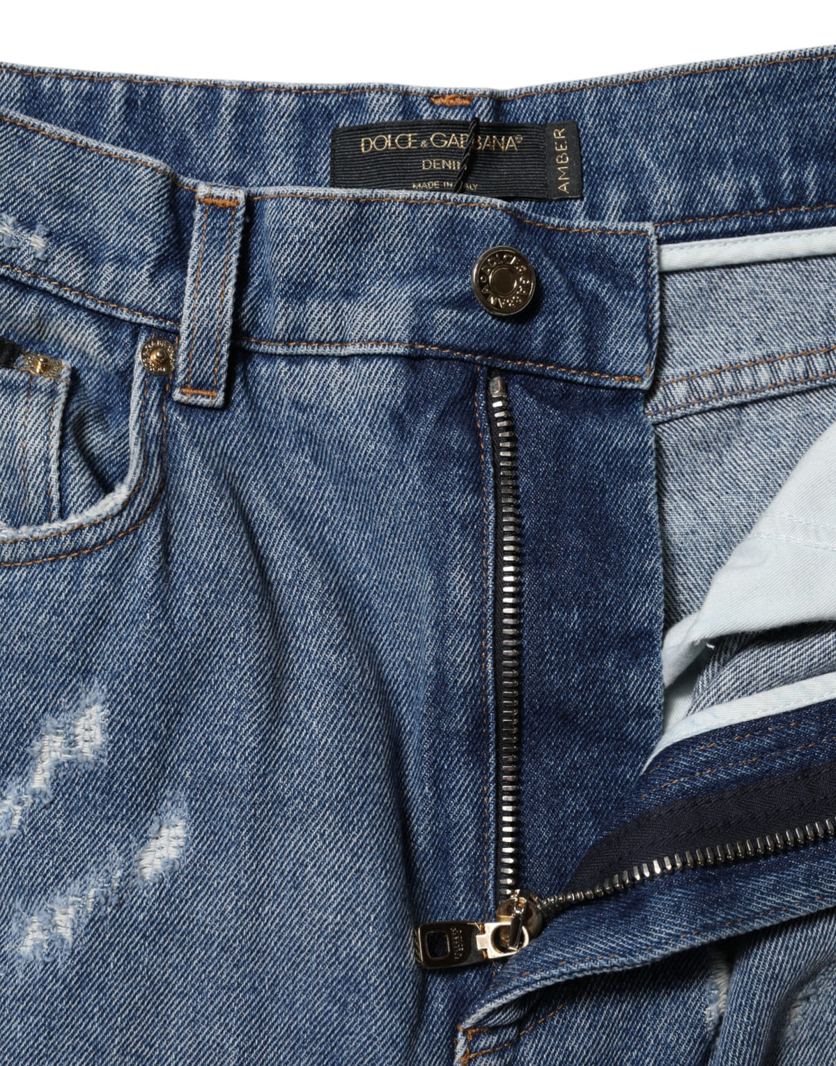 Experience the allure of Dolce & Gabbana's Blue Cotton Tattered High Waist Denim Jeans, where luxurious craftsmanship meets bold artistry for timeless elegance.